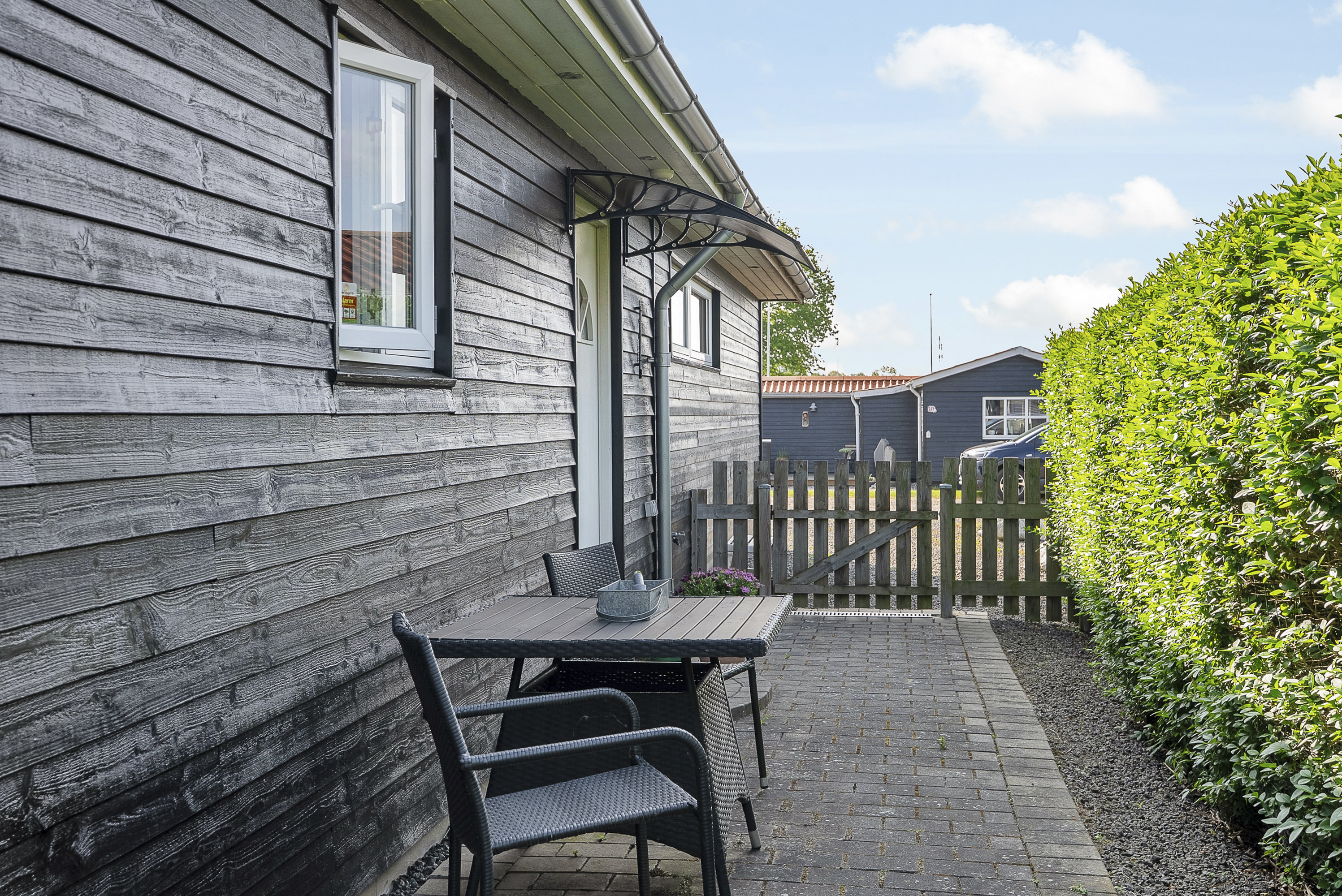 Fremhævet facade billede i fuldskærmstilstand. Billede af Krusesvej 17, Hasmark Strand, 5450 Otterup