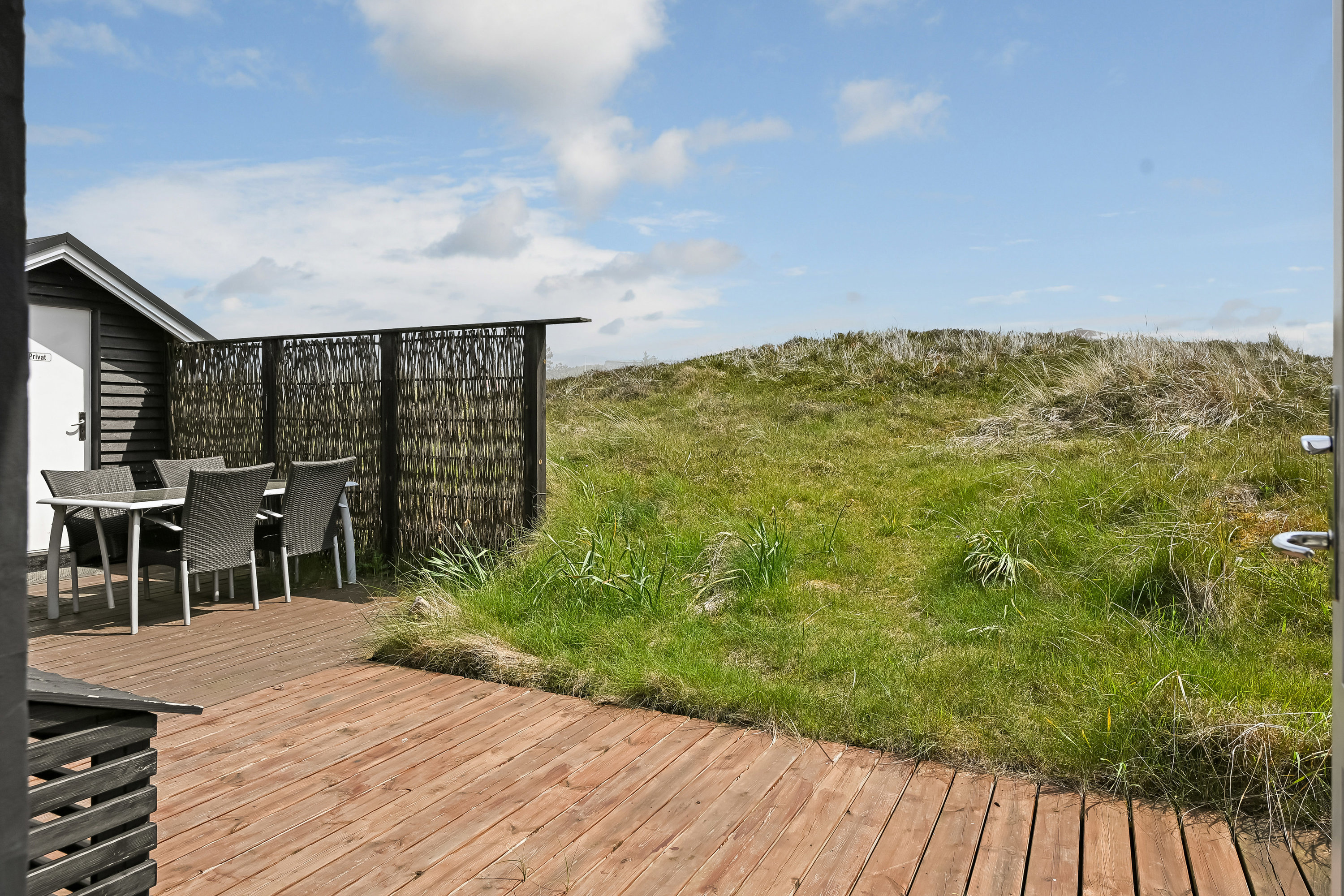 Fremhævet terrasse billede i fuldskærmstilstand. Billede af Norges Fjelde 44, Fanø Bad, 6720 Fanø