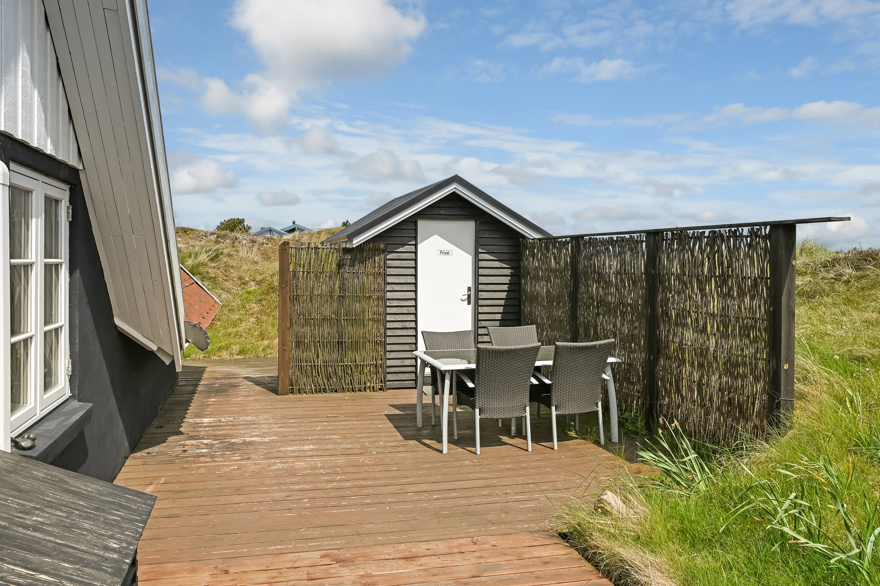 Fremhævet terrasse billede i fuldskærmstilstand. Billede af Norges Fjelde 44, Fanø Bad, 6720 Fanø