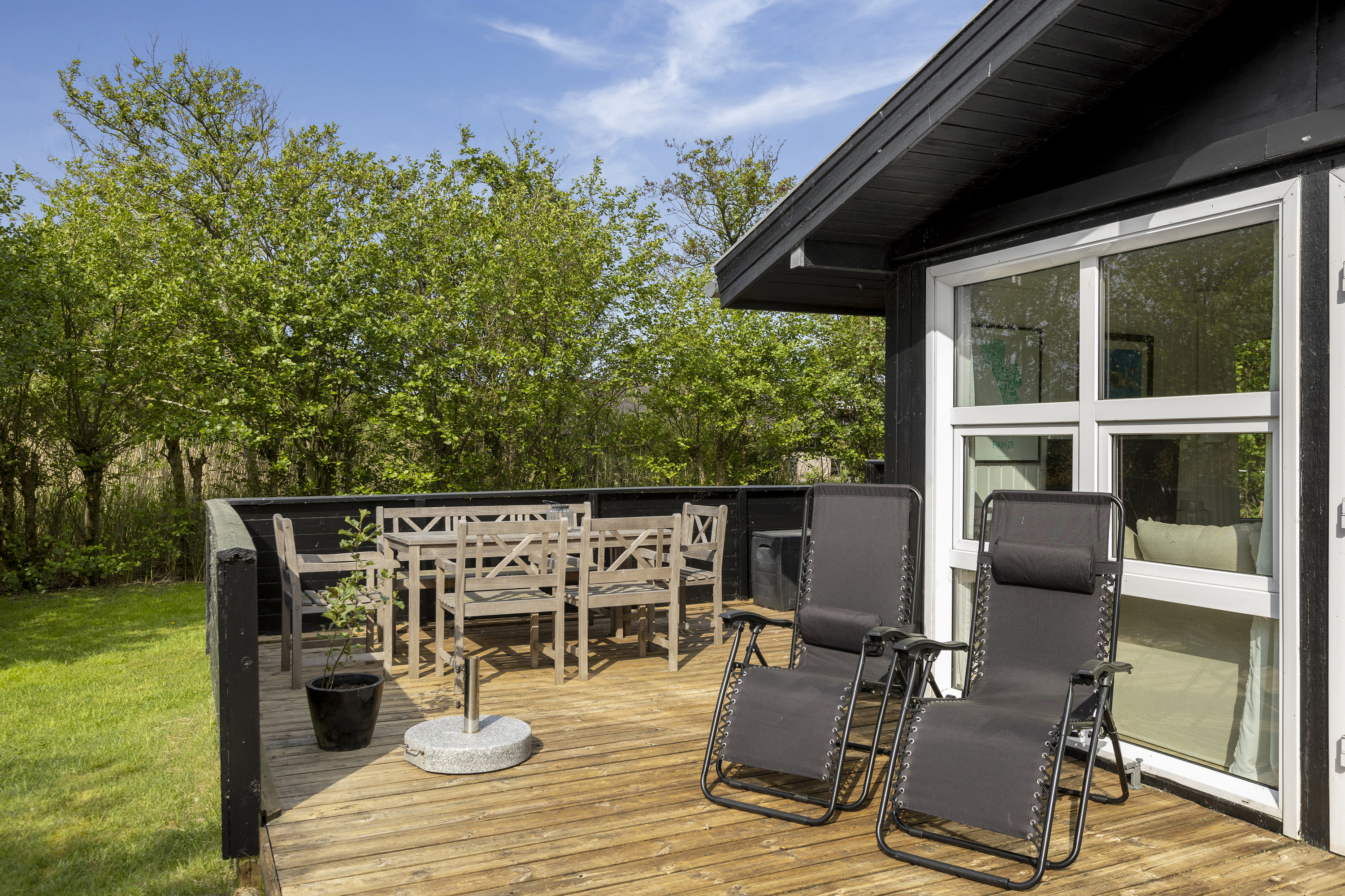 Fremhævet terrasse billede i fuldskærmstilstand. Billede af Engdraget 26, Rindby Strand, 6720 Fanø