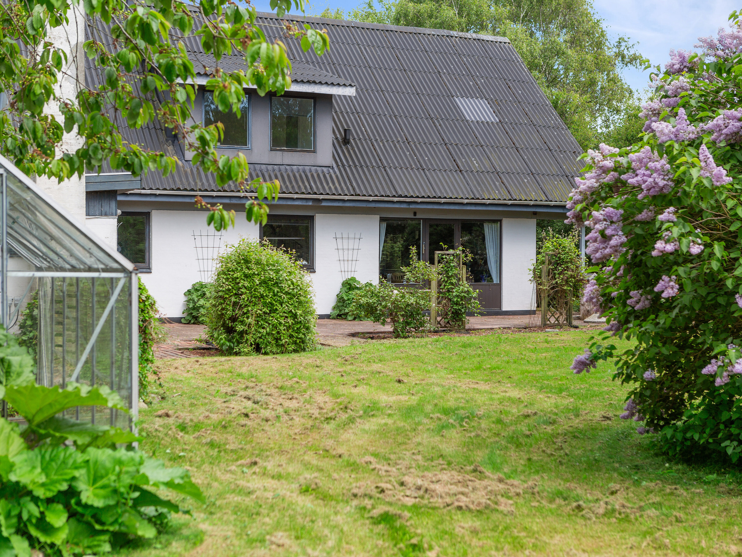 Fremhævet set fra haven billede i fuldskærmstilstand. Billede af Tornager 3, Rakkeby, 9800 Hjørring