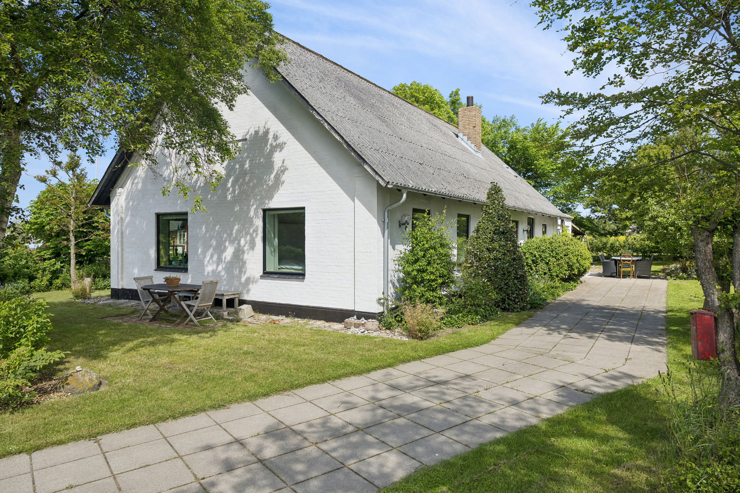 Fremhævet set fra haven billede i fuldskærmstilstand. Billede af Lundgårdsvej 13, Uggerby, 9800 Hjørring