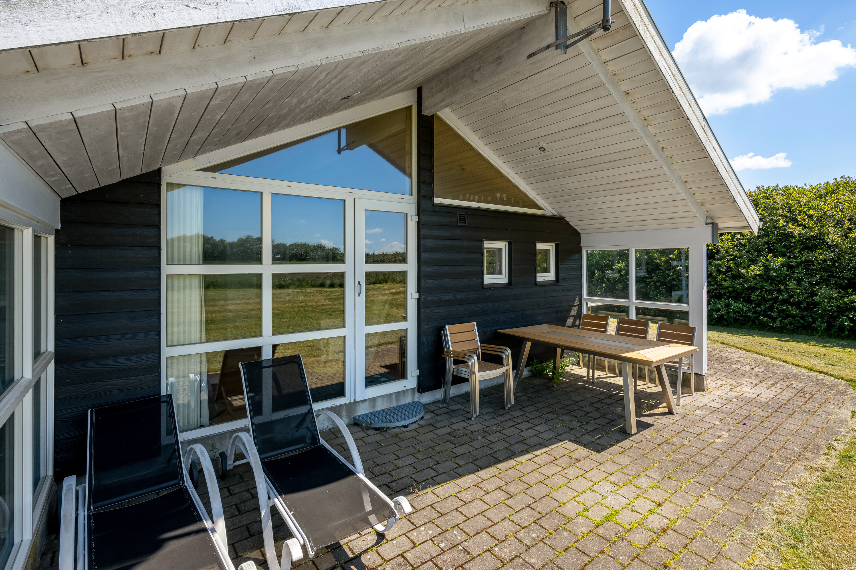 Fremhævet overdækket terrasse billede i fuldskærmstilstand. Billede af Sivsangervænget 51, Skaven, 6880 Tarm