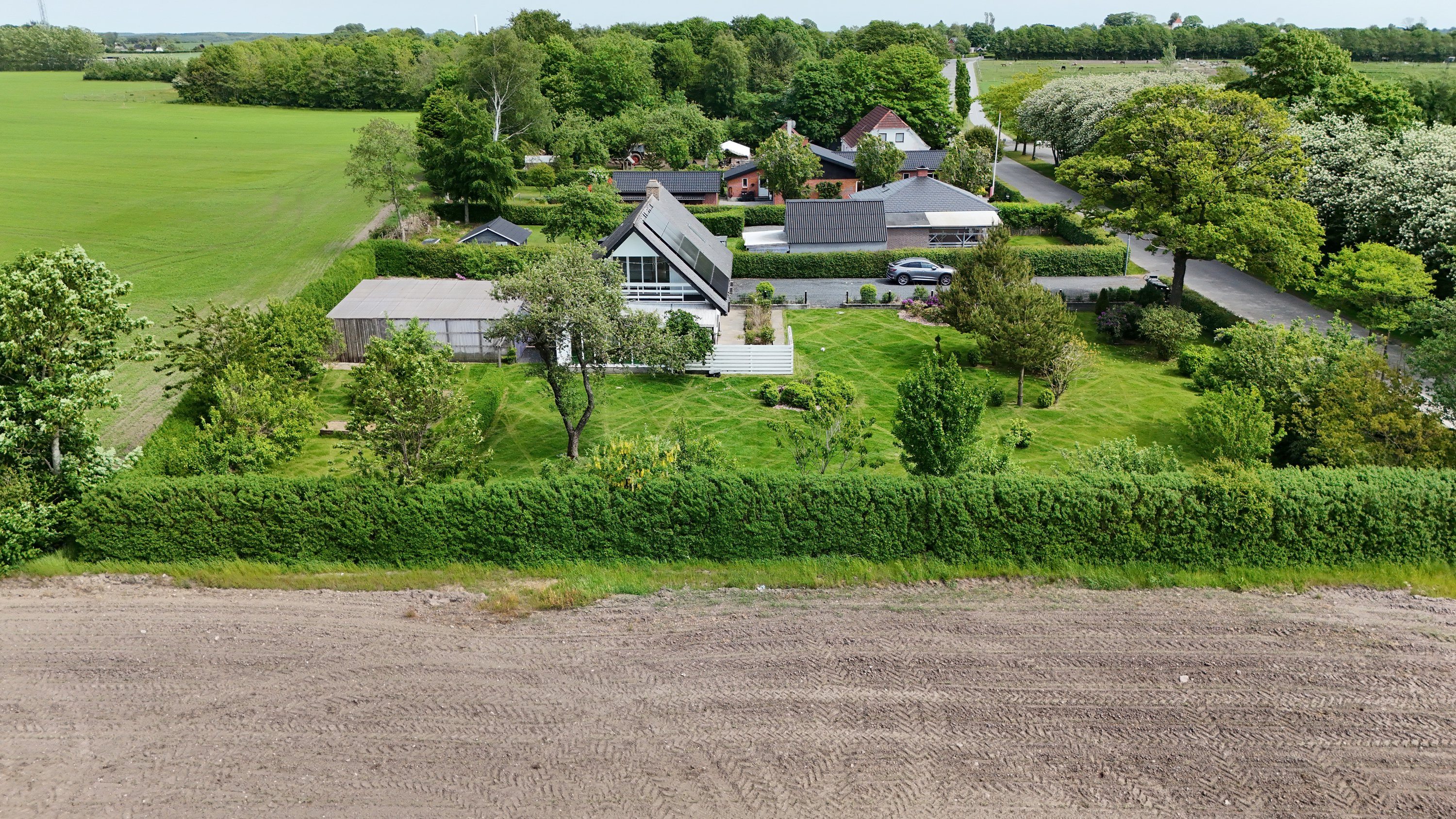 Fremhævet drone1 billede i fuldskærmstilstand. Billede af Bygaden 42, Ravnkilde, 9610 Nørager