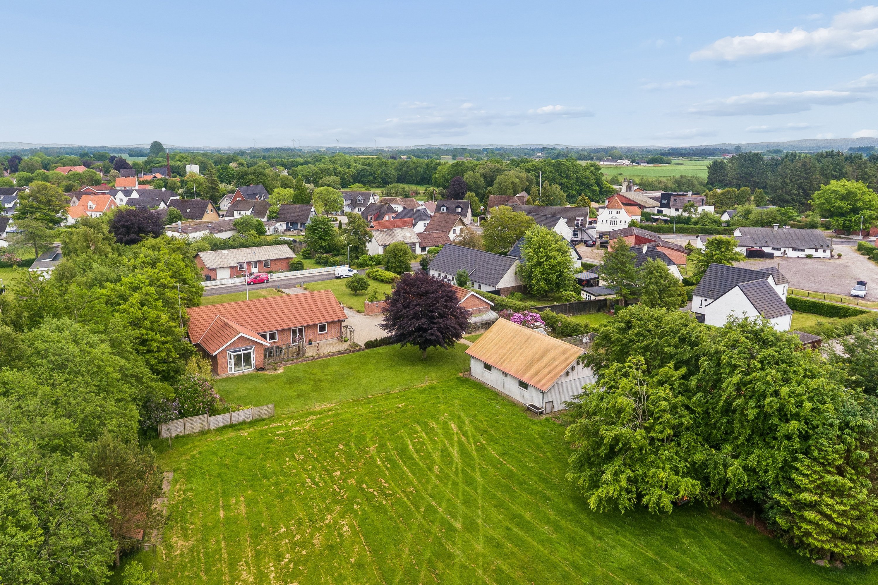 Fremhævet luftfoto billede i fuldskærmstilstand. Billede af Vinkelvej 14, Flauenskjold, 9330 Dronninglund