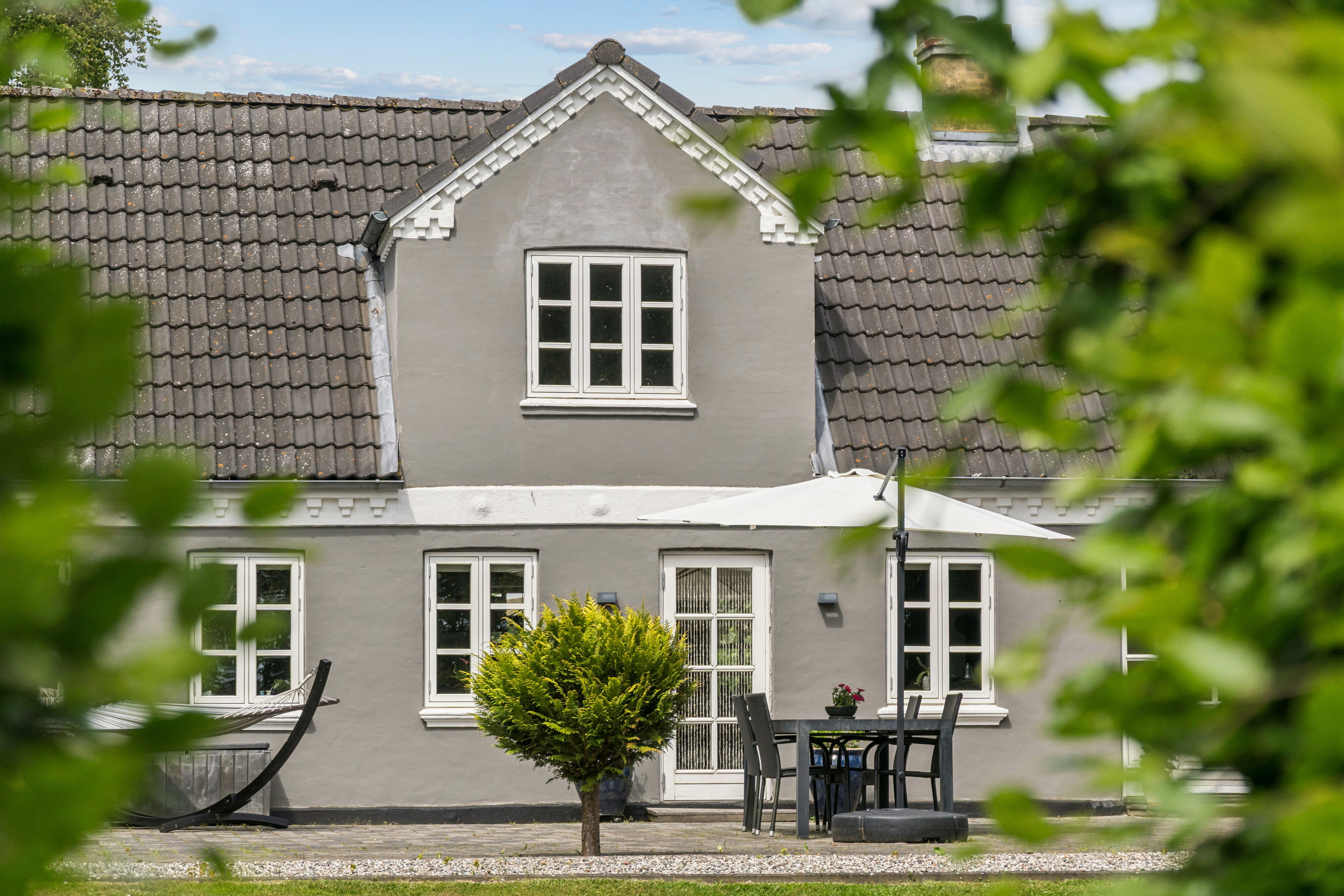 Fremhævet set fra haven billede i fuldskærmstilstand. Billede af Balskildevej 10, Ballen, 8355 Solbjerg