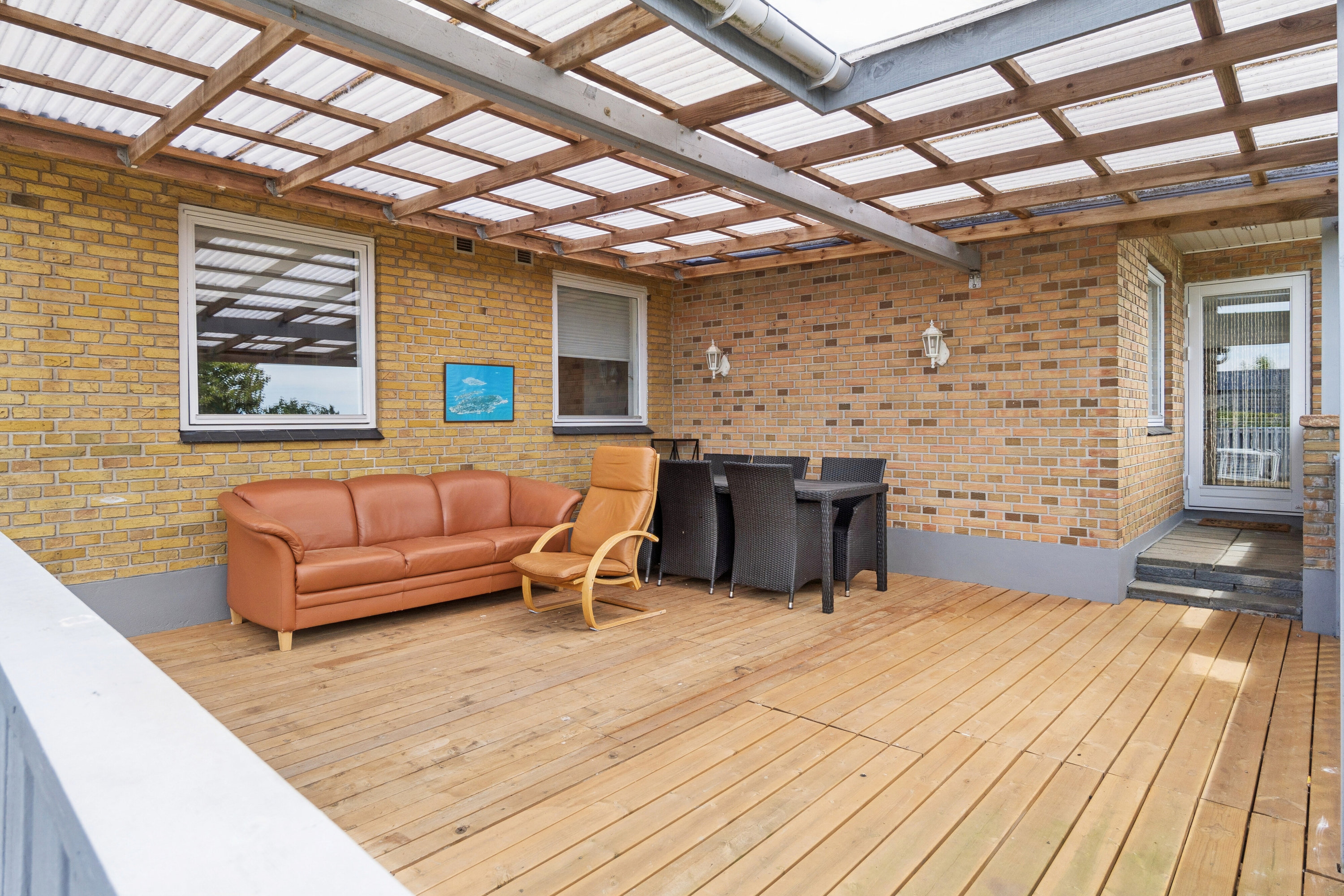 Fremhævet overdækket terrasse billede i fuldskærmstilstand. Billede af Møllebakken 11, Hasle, 3790 Hasle