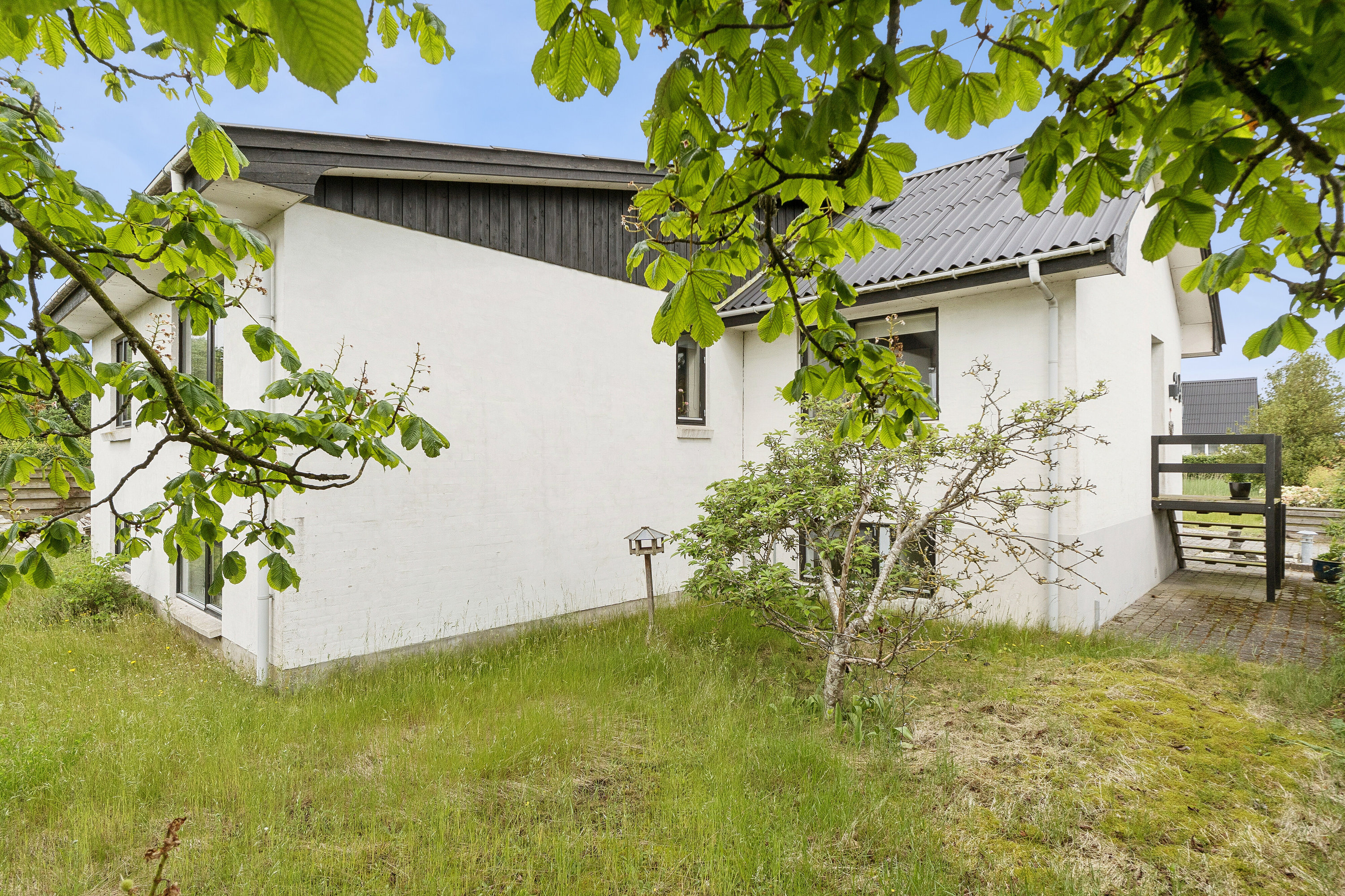 Fremhævet set fra haven billede i fuldskærmstilstand. Billede af Baldersvej 24, 9800 Hjørring