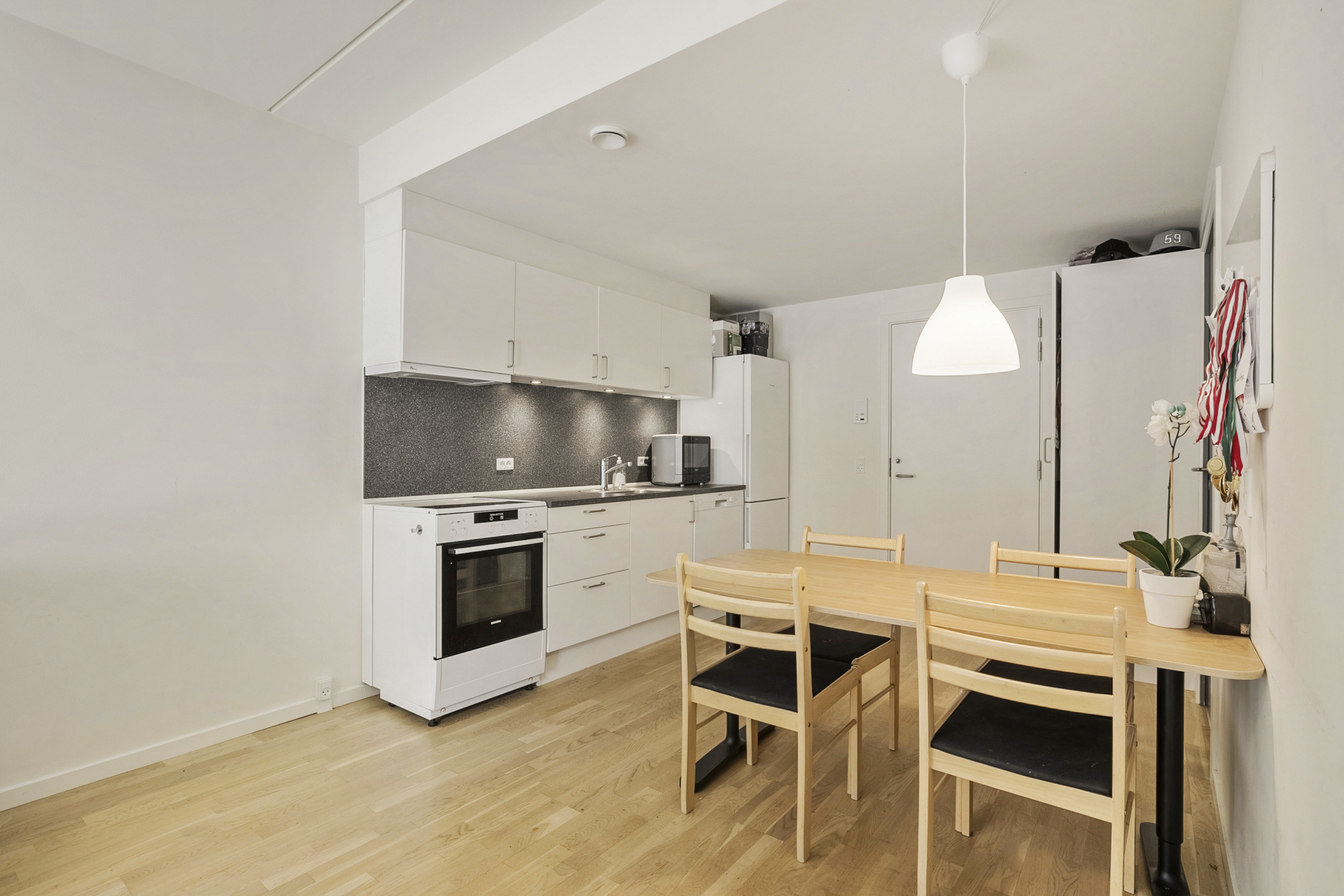Fremhævet spisekøkken billede i fuldskærmstilstand. Billede af Østre Stationsvej 39A, st.. 2., 5000 Odense C