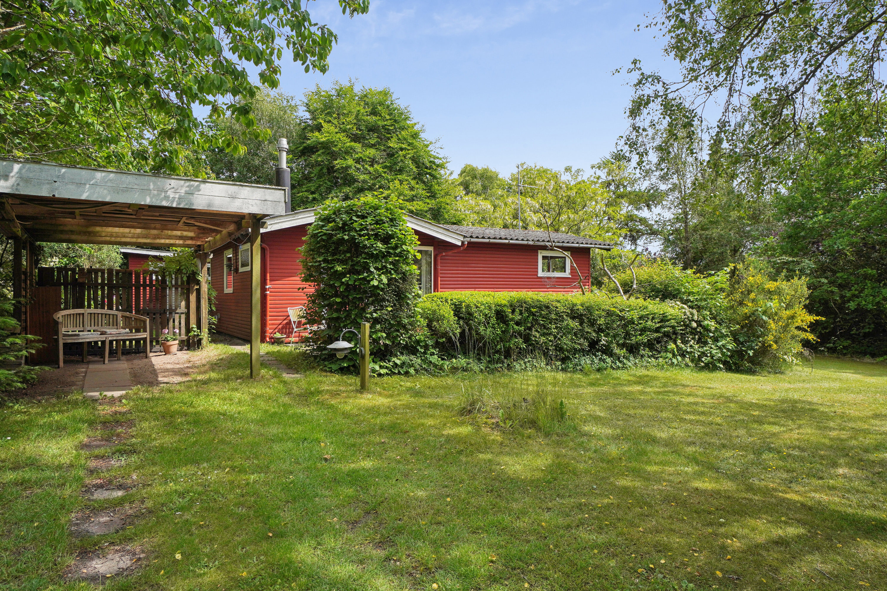 Fremhævet set fra haven billede i fuldskærmstilstand. Billede af Petrine Sonnesvej 2, Evetofte, 3370 Melby