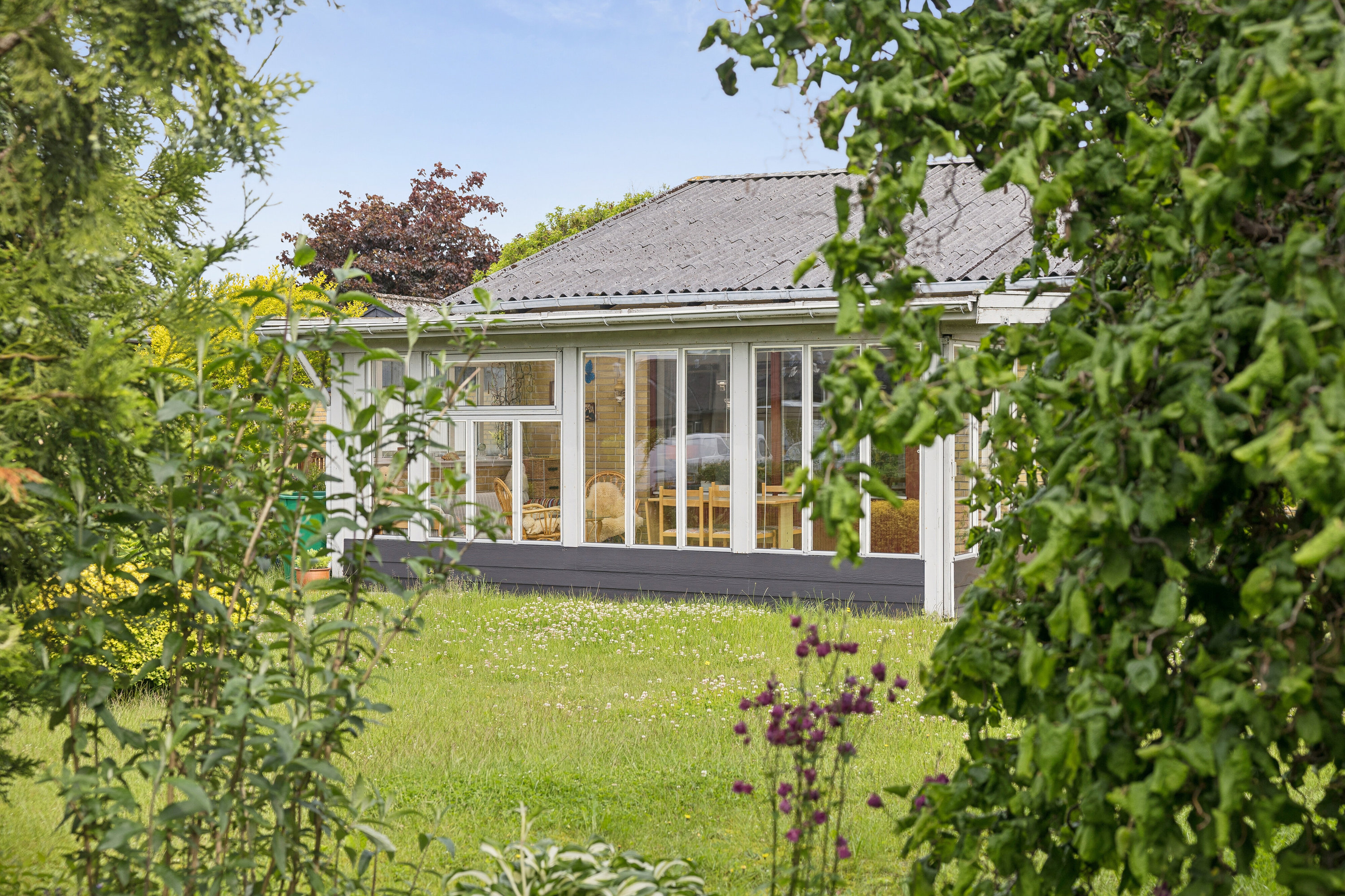 Fremhævet set fra haven billede i fuldskærmstilstand. Billede af Nørgårdsvej 8, 9881 Bindslev