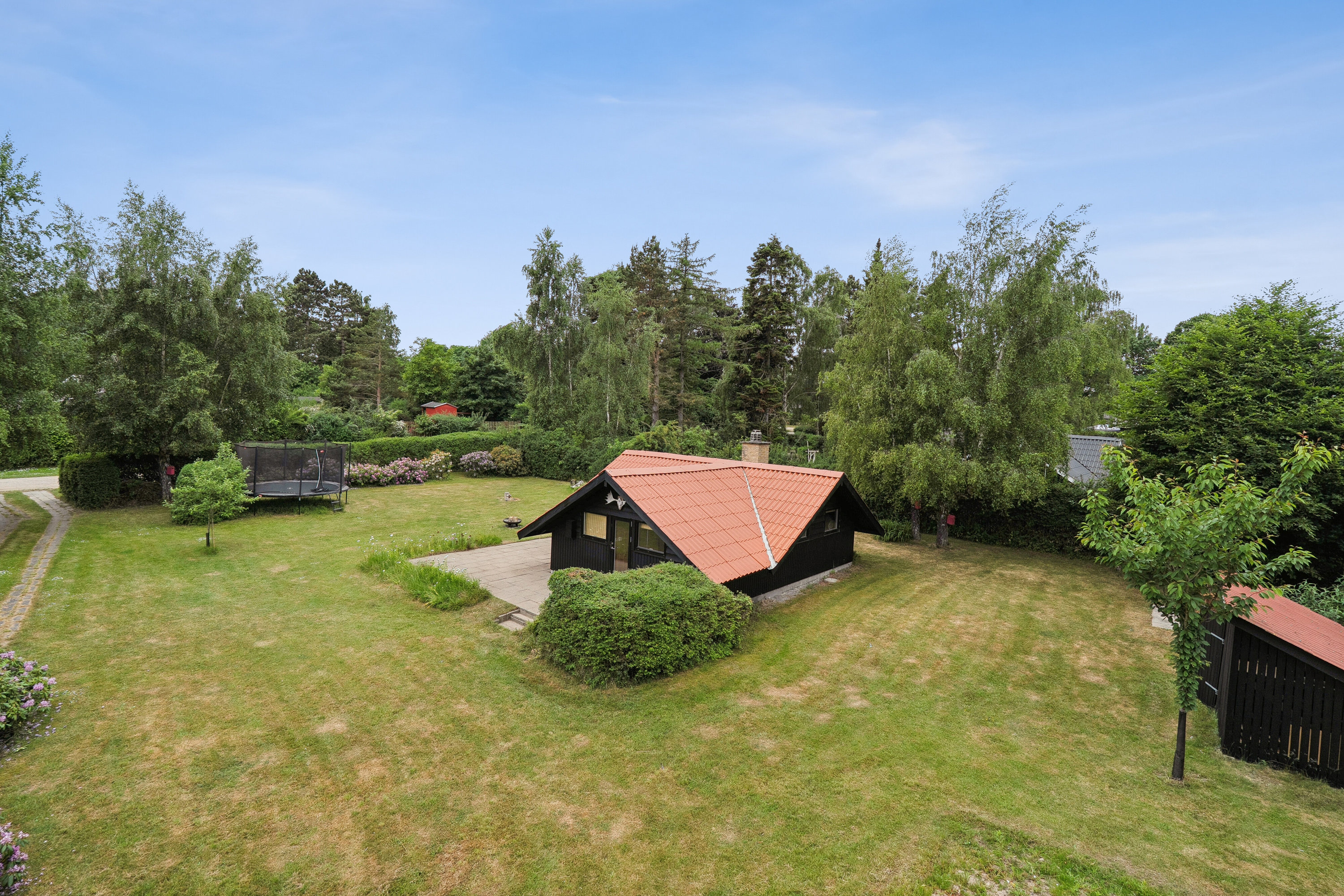 Fremhævet set fra haven billede i fuldskærmstilstand. Billede af Lupinvej 3, Bønsvig Str, 4720 Præstø