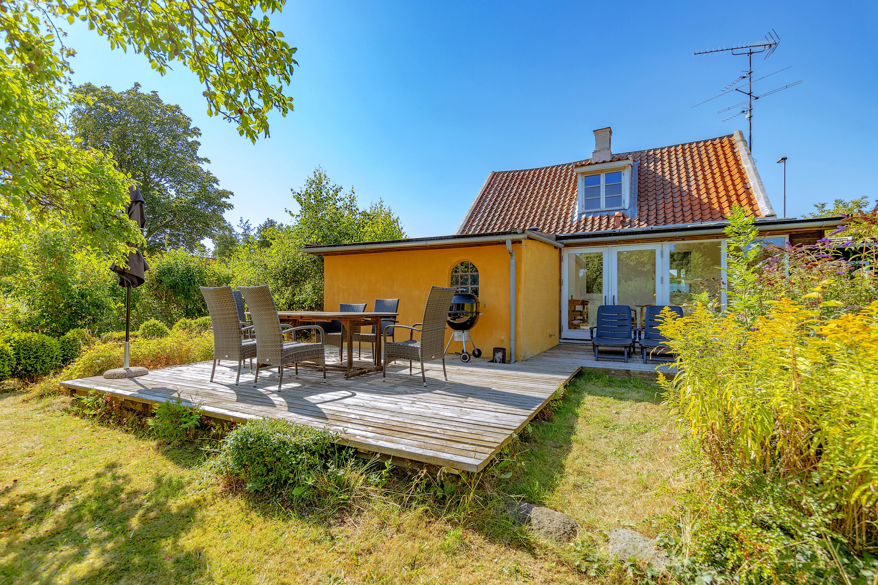 Fremhævet terrasse billede i fuldskærmstilstand. Billede af Tom Knudsensvej 44, Lohals, 5953 Tranekær