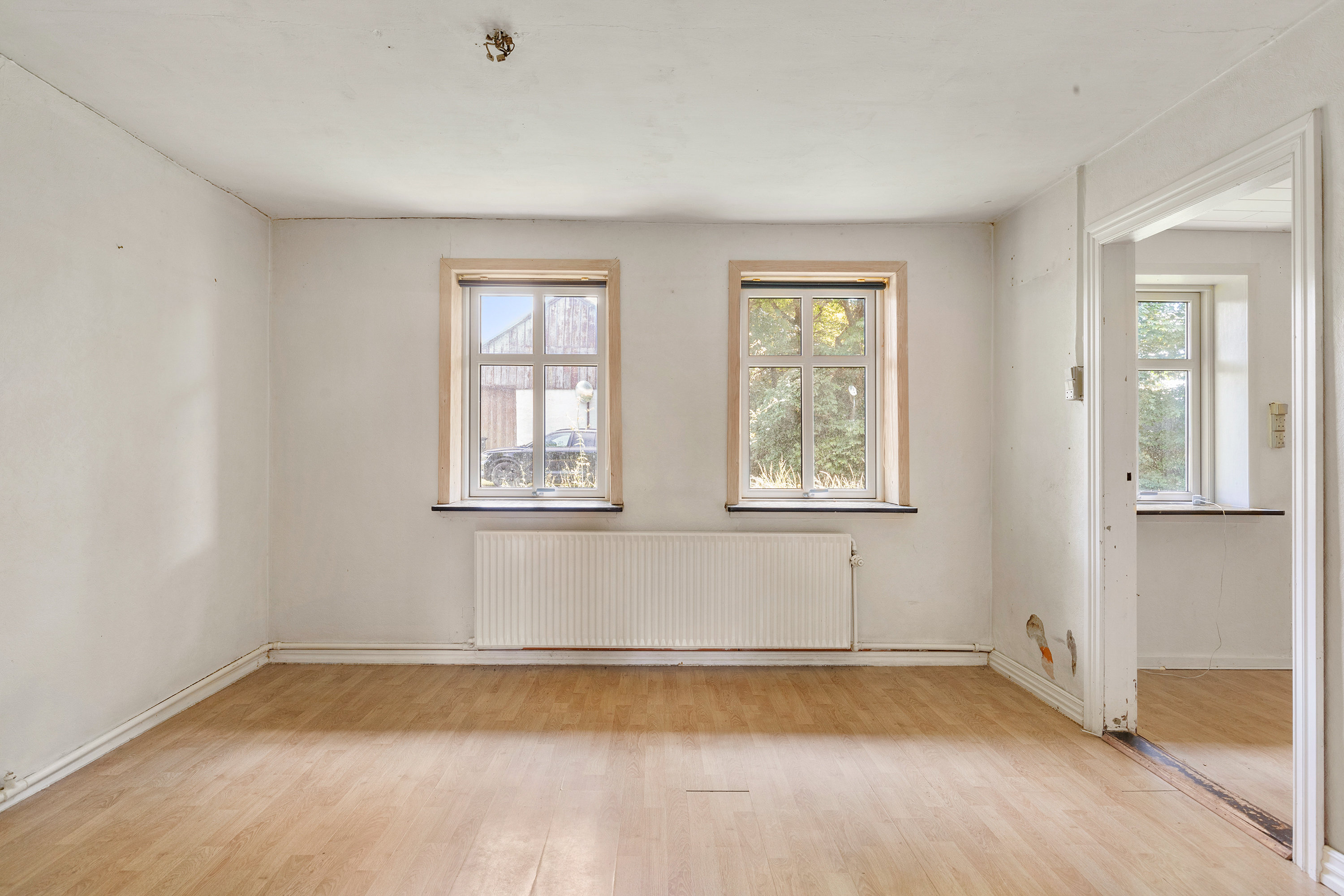 Fremhævet stue billede i fuldskærmstilstand. Billede af Korsholmvej 9, Korsholm, 9690 Fjerritslev