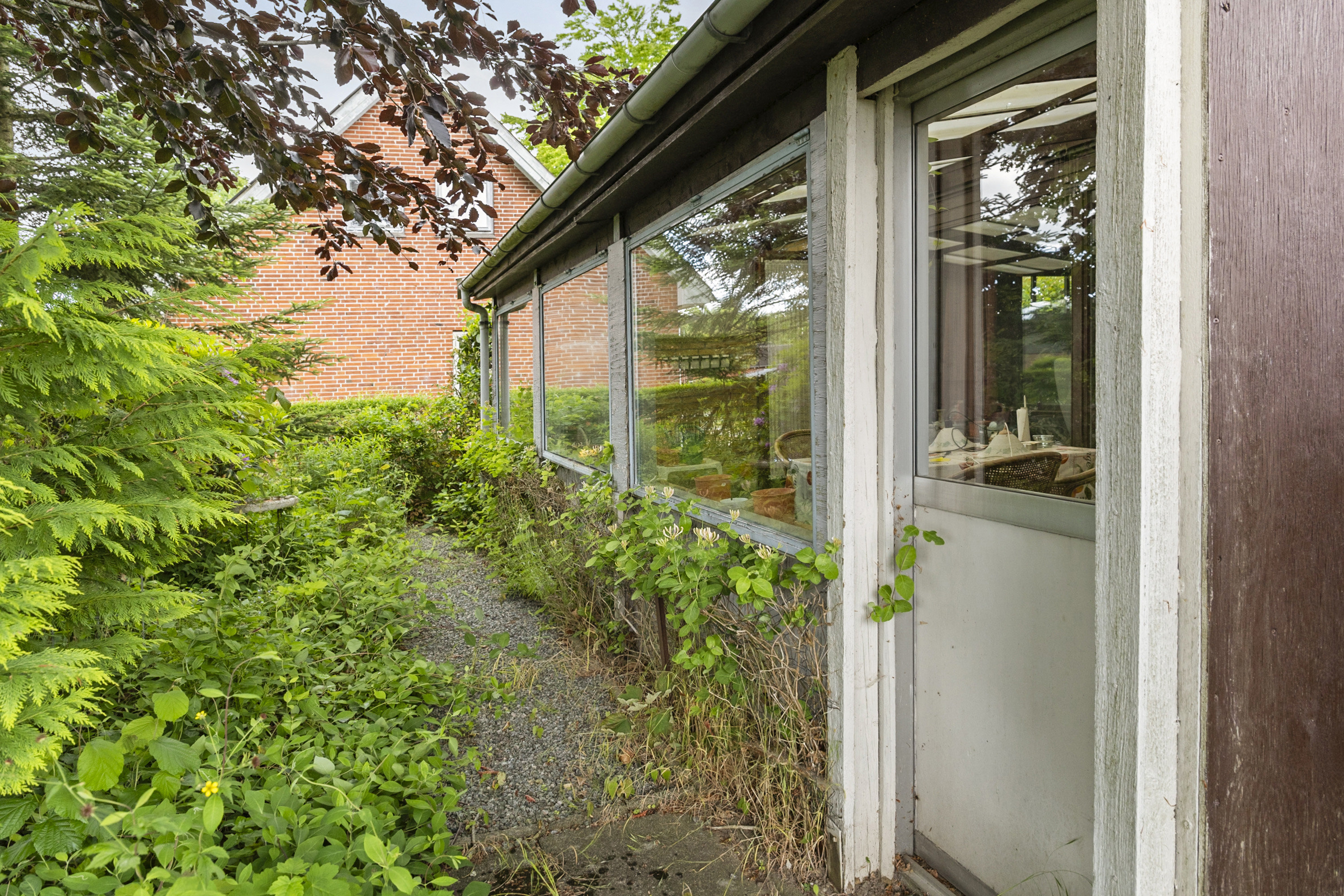 Fremhævet entré billede i fuldskærmstilstand. Billede af Lovbjergvej 14, Fangel, 5260 Odense S