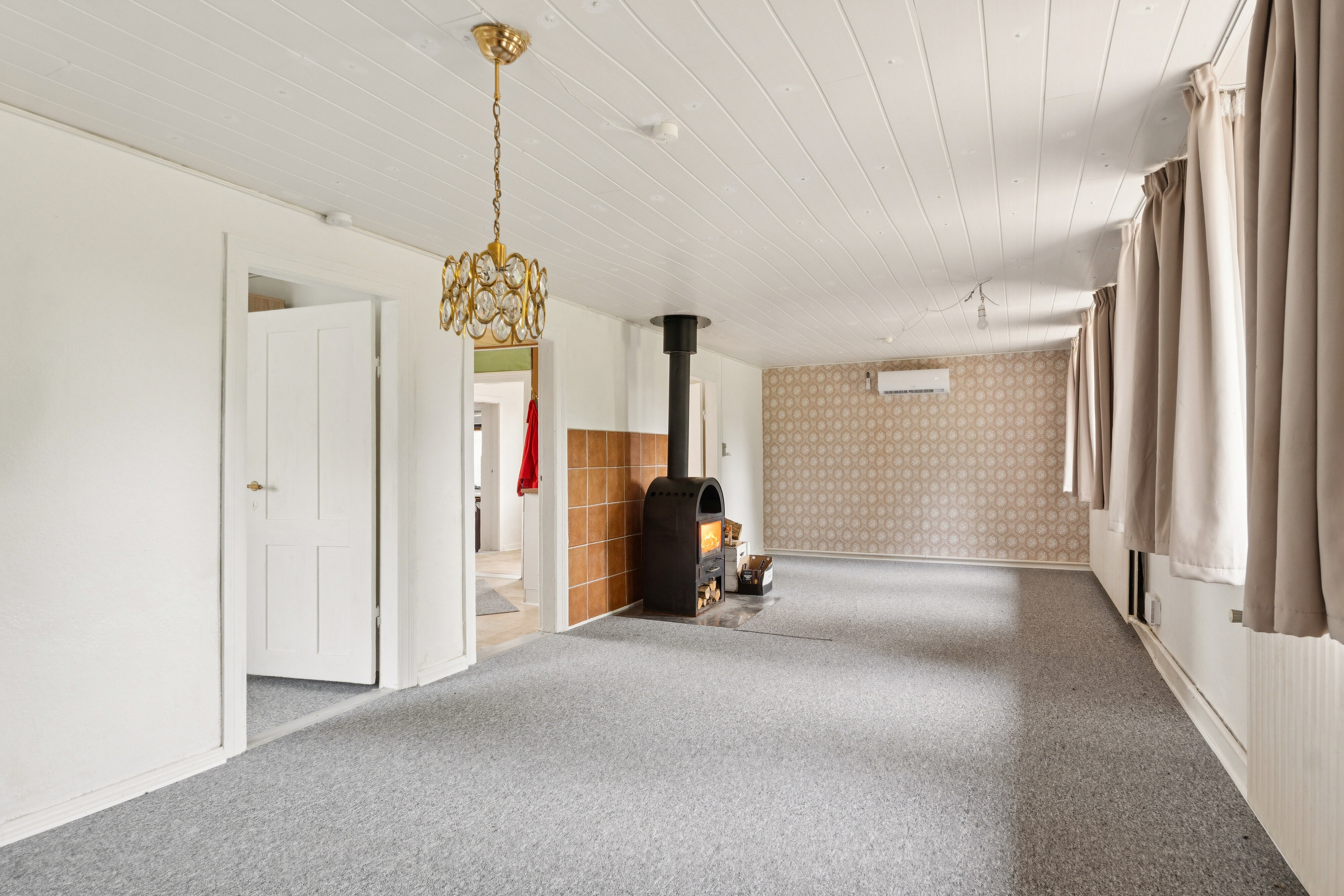 Fremhævet stue billede i fuldskærmstilstand. Billede af Nørskovlundvej 57, Illerhuse, 8643 Ans By
