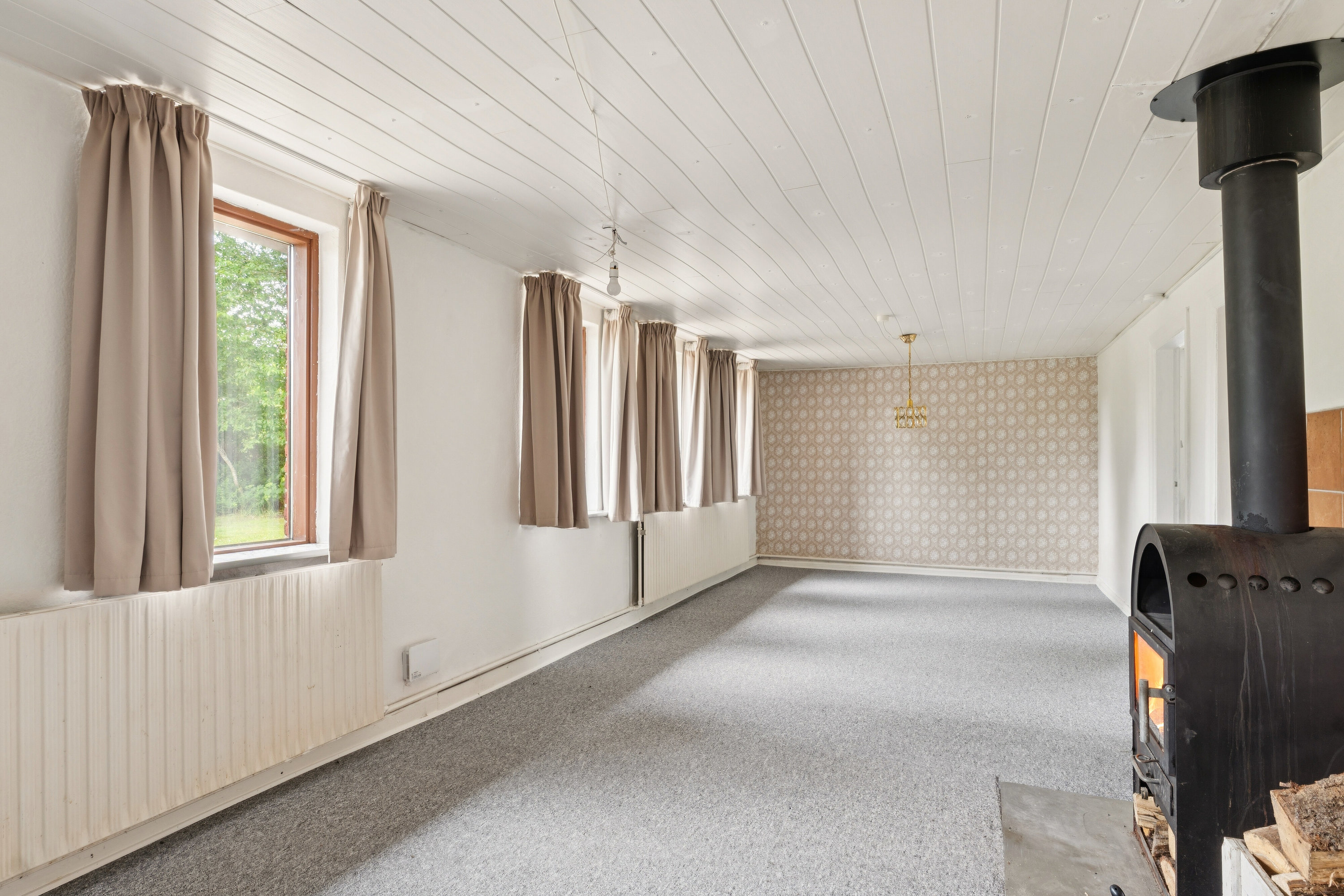 Fremhævet stue billede i fuldskærmstilstand. Billede af Nørskovlundvej 57, Illerhuse, 8643 Ans By