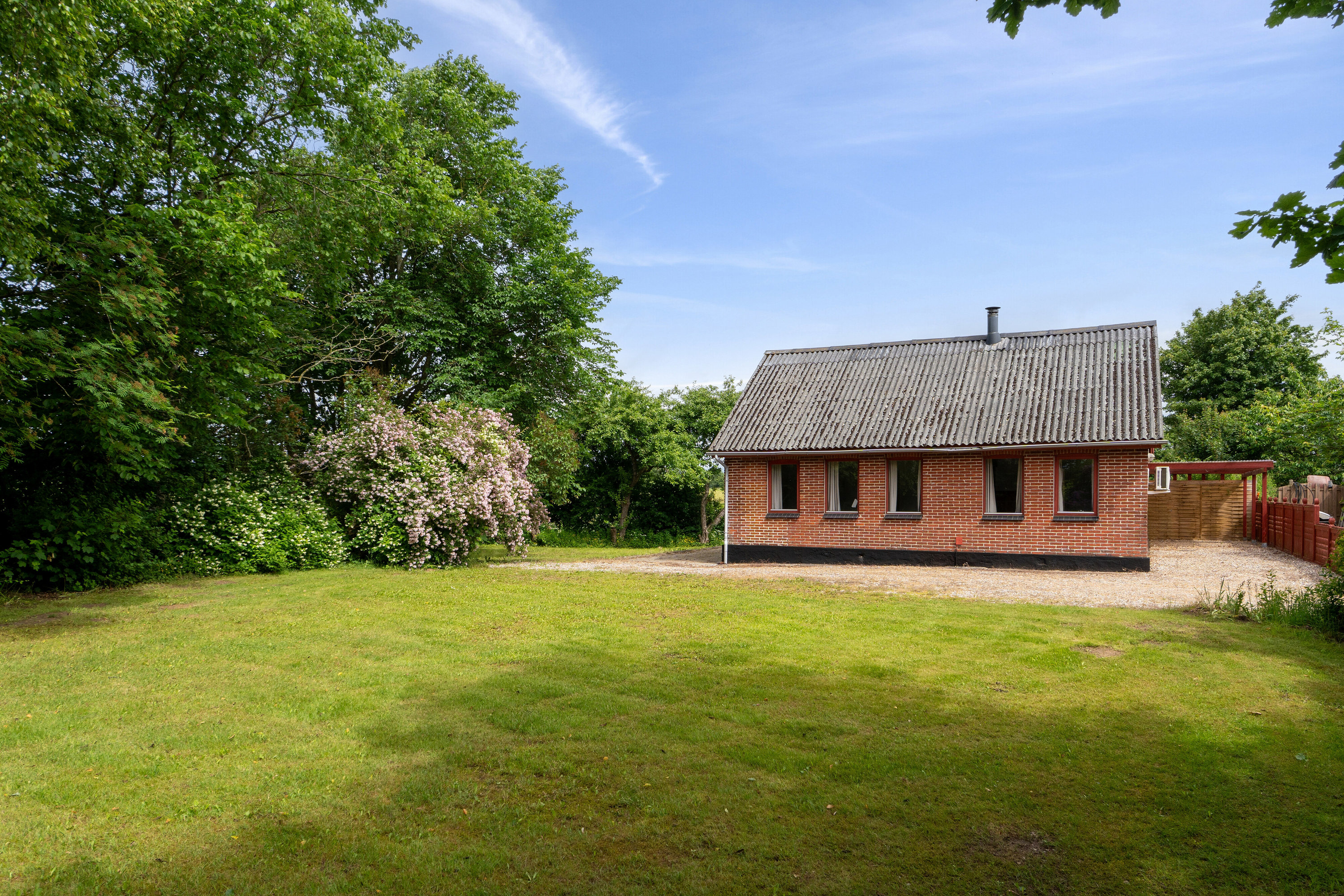 Fremhævet set fra haven billede i fuldskærmstilstand. Billede af Nørskovlundvej 57, Illerhuse, 8643 Ans By