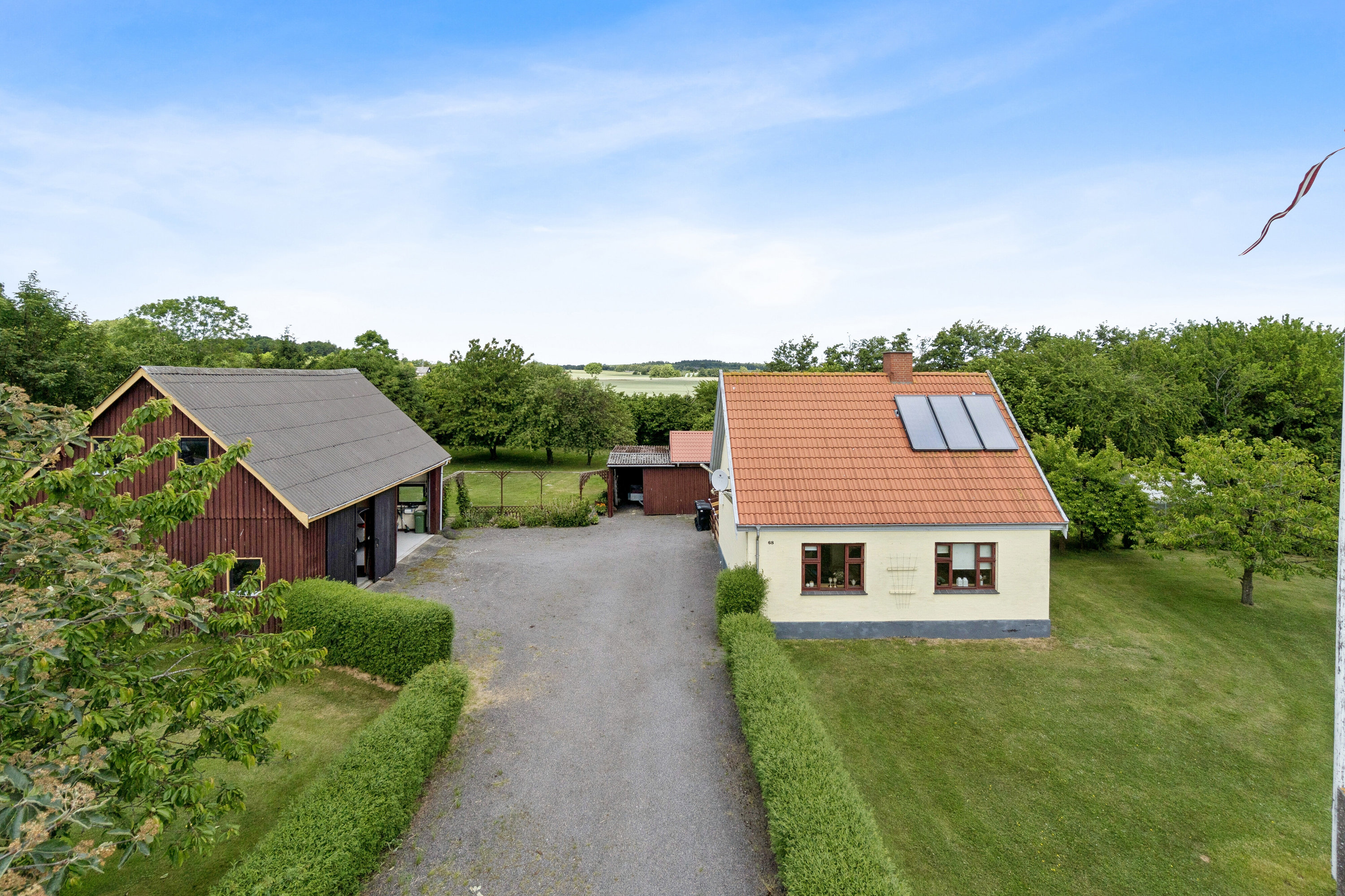 Fremhævet set fra haven billede i fuldskærmstilstand. Billede af Almindingensvej 68, Østermarie, 3751 Østermarie