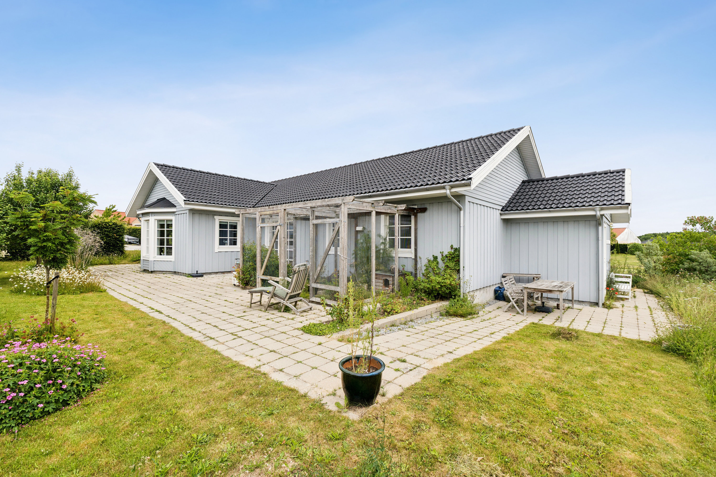 Fremhævet set fra haven billede i fuldskærmstilstand. Billede af Bøgeholmen 3, Gundsømagle, 4000 Roskilde