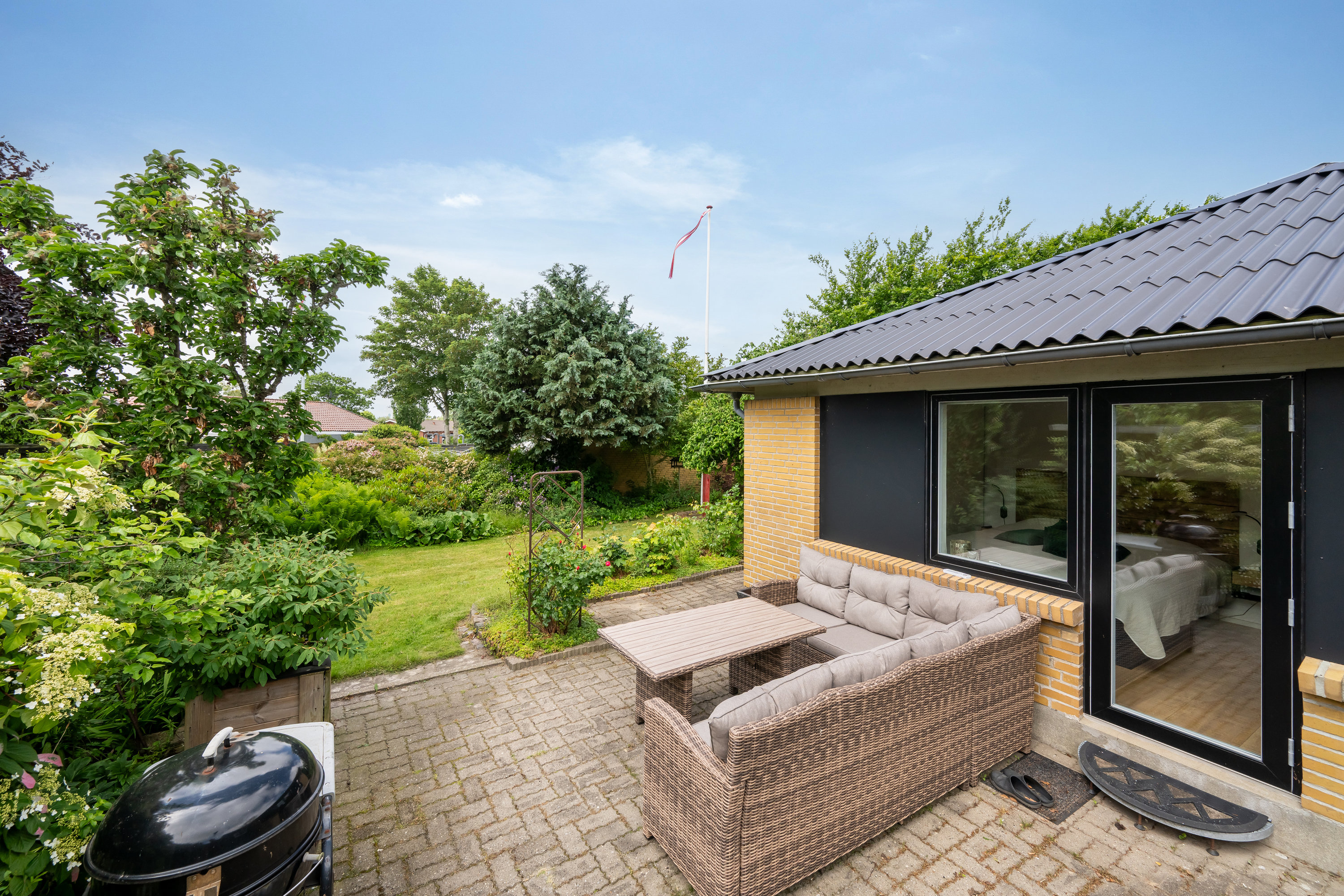 Fremhævet terrasse billede i fuldskærmstilstand. Billede af Brogaardsvænget 16, Rindum, 6950 Ringkøbing