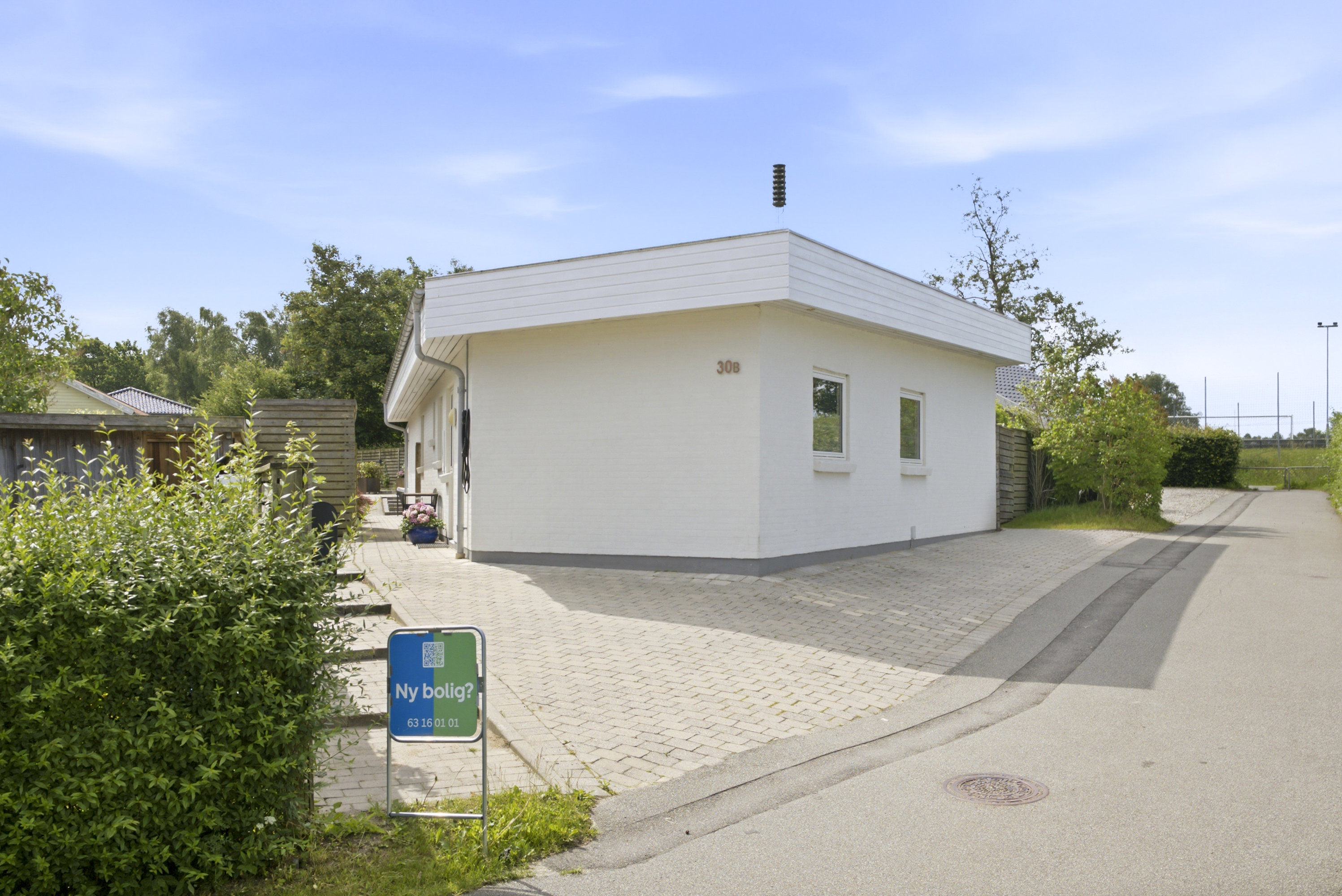 Fremhævet facade billede i fuldskærmstilstand. Billede af Spangsvej 30B, Paarup, 5210 Odense NV