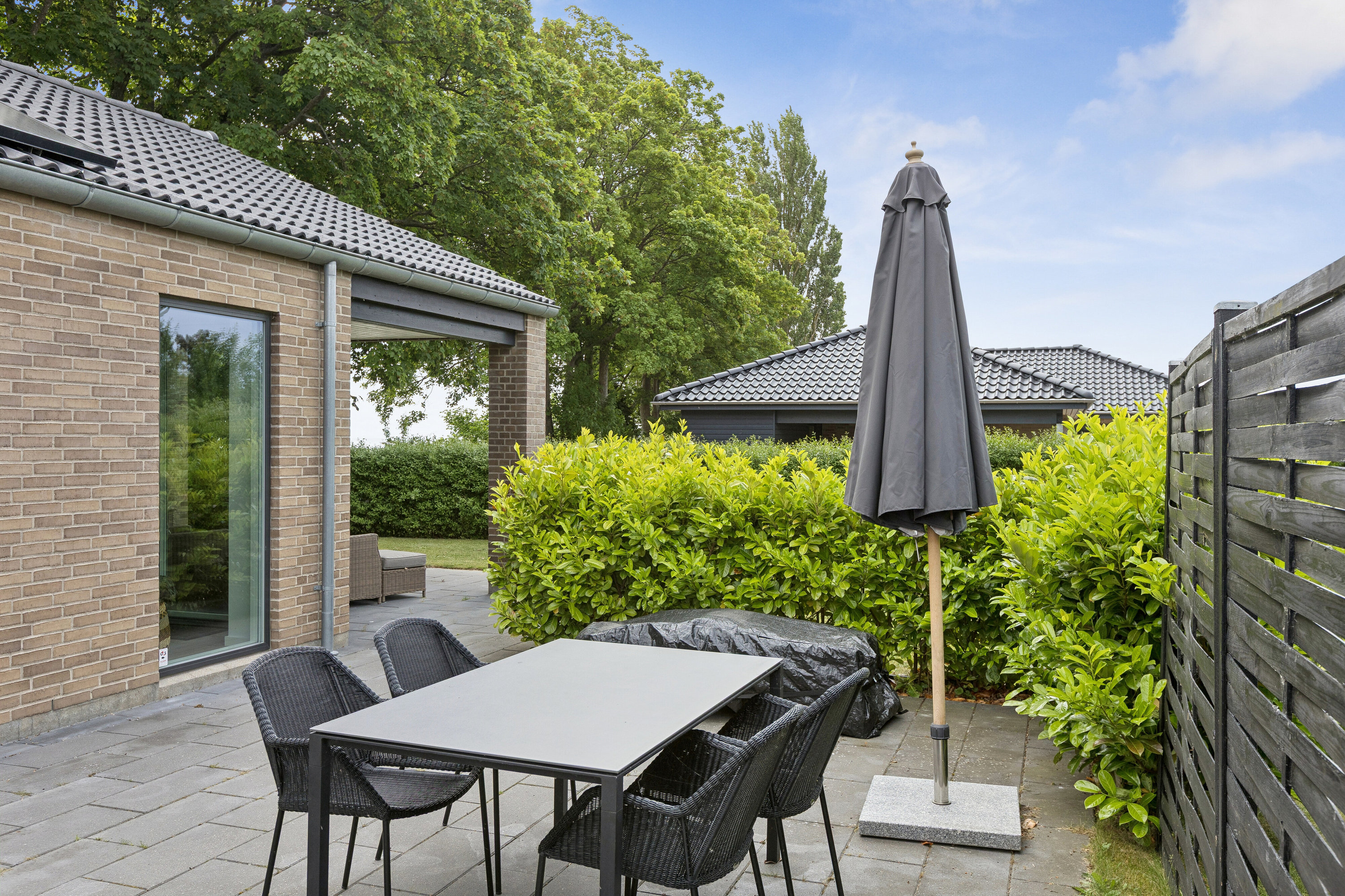 Fremhævet terrasse billede i fuldskærmstilstand. Billede af Vintervej 7, 4654 Faxe Ladeplads