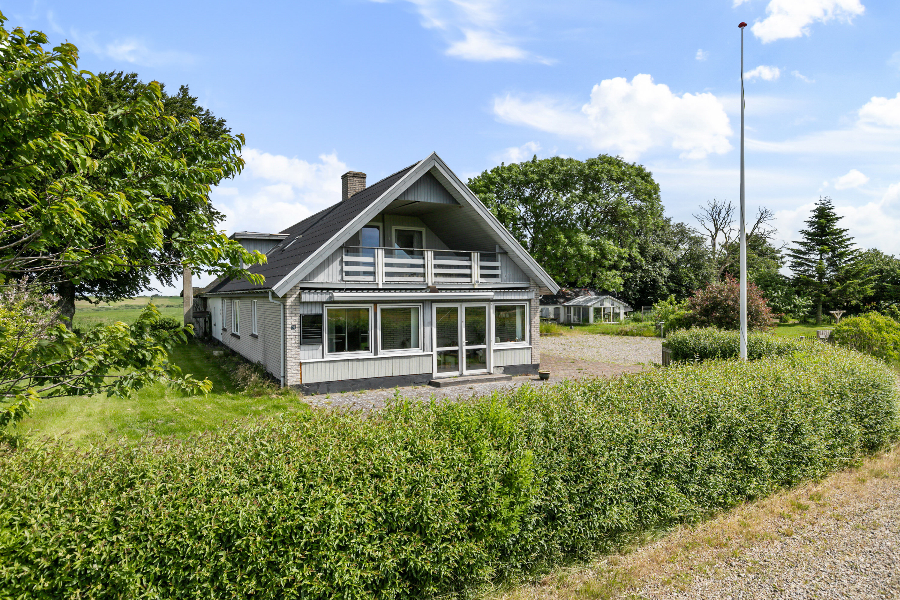 Fremhævet facade billede i fuldskærmstilstand. Billede af Gunderupvej 32, Tandrup, 9640 Farsø
