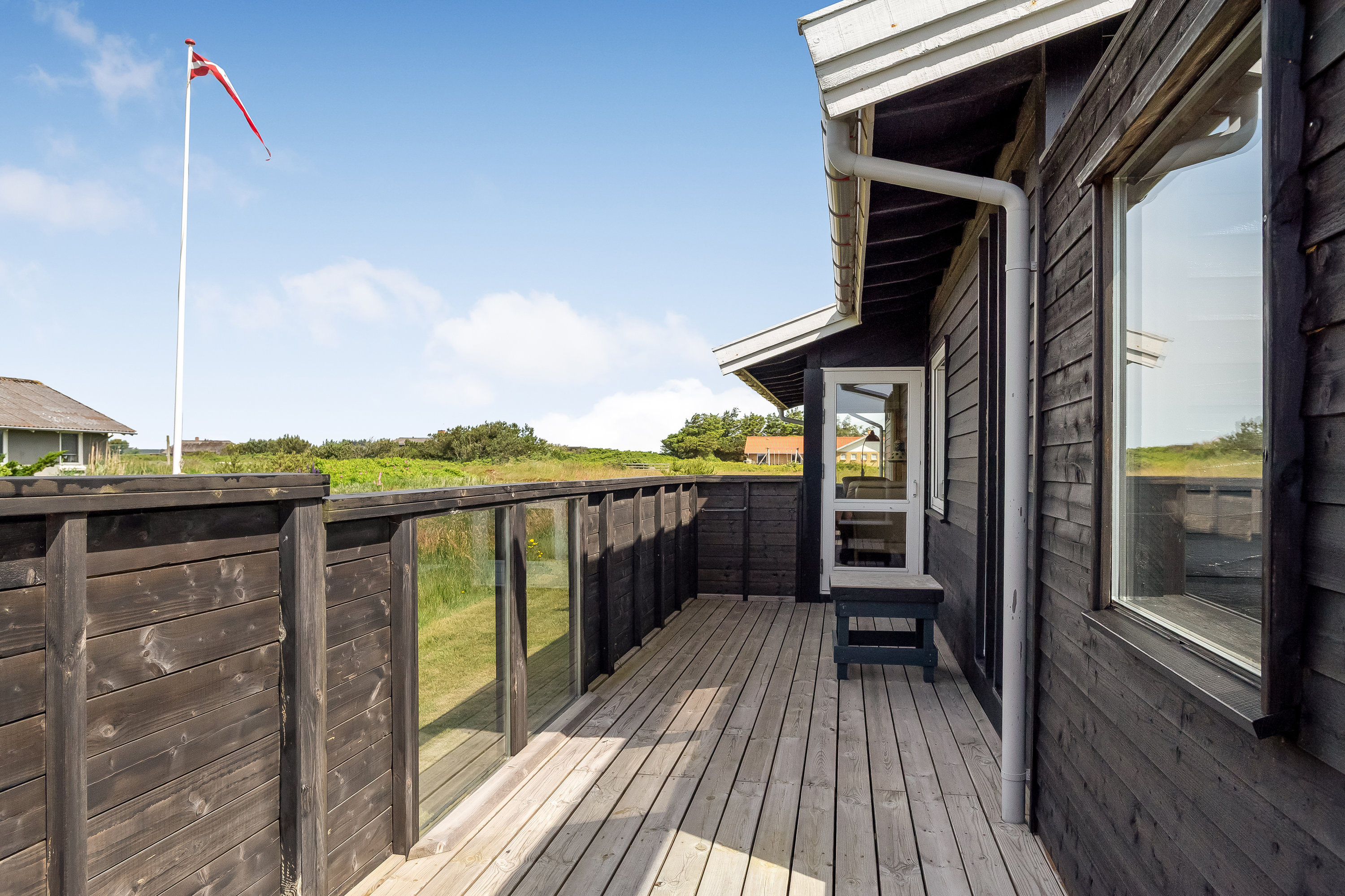 Fremhævet terrasse billede i fuldskærmstilstand. Billede af Hermodsvej 2, 7673 Harboøre