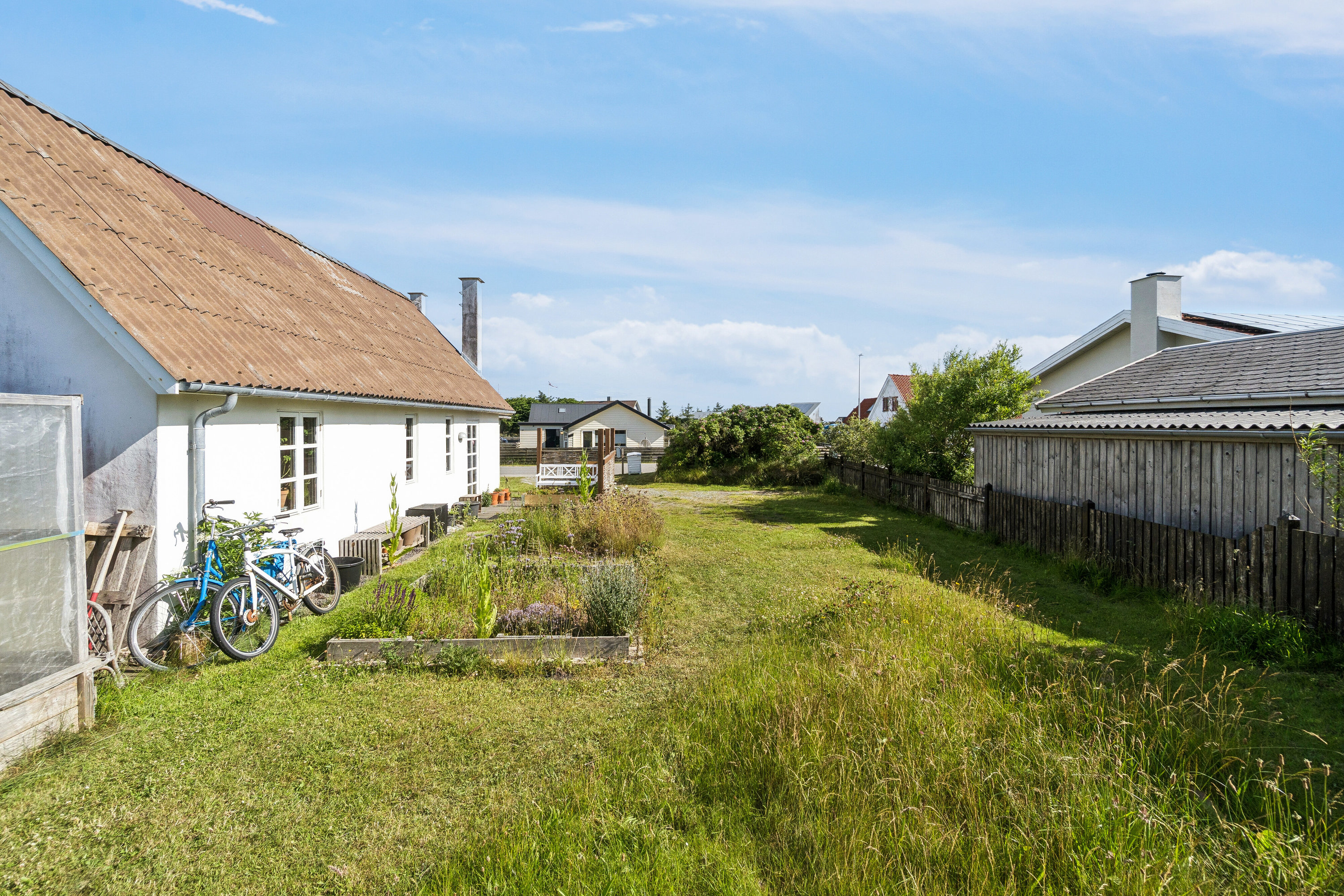 Fremhævet set fra haven billede i fuldskærmstilstand. Billede af Ørhagevej 39A, Klitmøller, 7700 Thisted