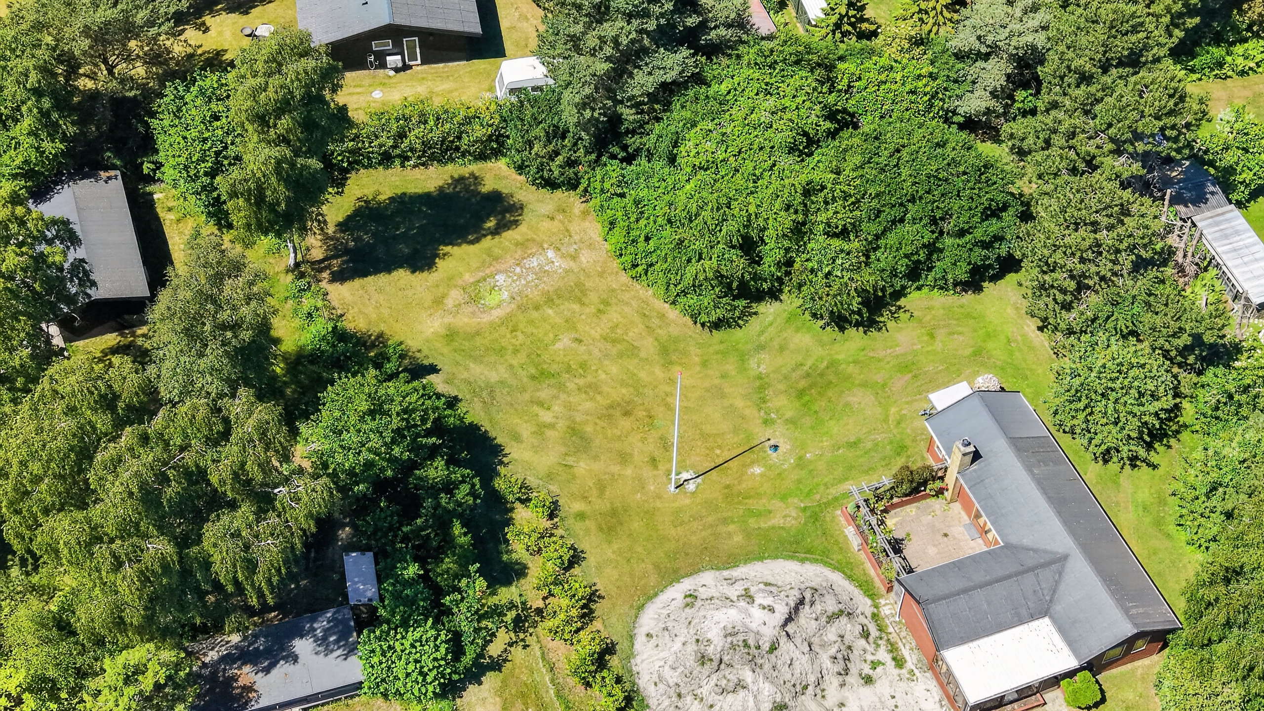 Fremhævet luftfoto billede i fuldskærmstilstand. Billede af Tjørneholmvej 32A, Ebbeløkke, 4500 Nykøbing Sj