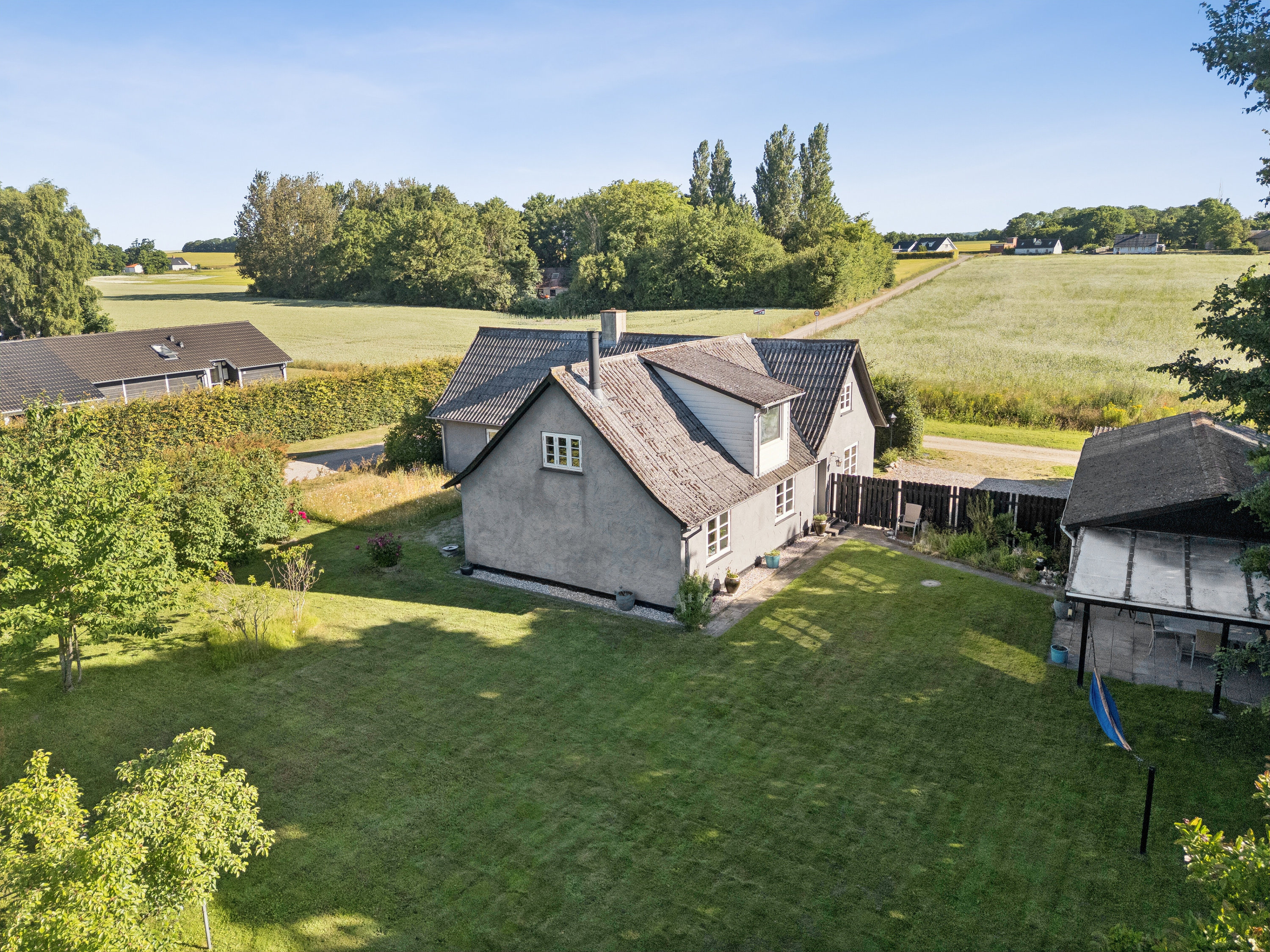 Fremhævet set fra haven billede i fuldskærmstilstand. Billede af Møldrupsvej 18, Dalby Strand, 4281 Gørlev