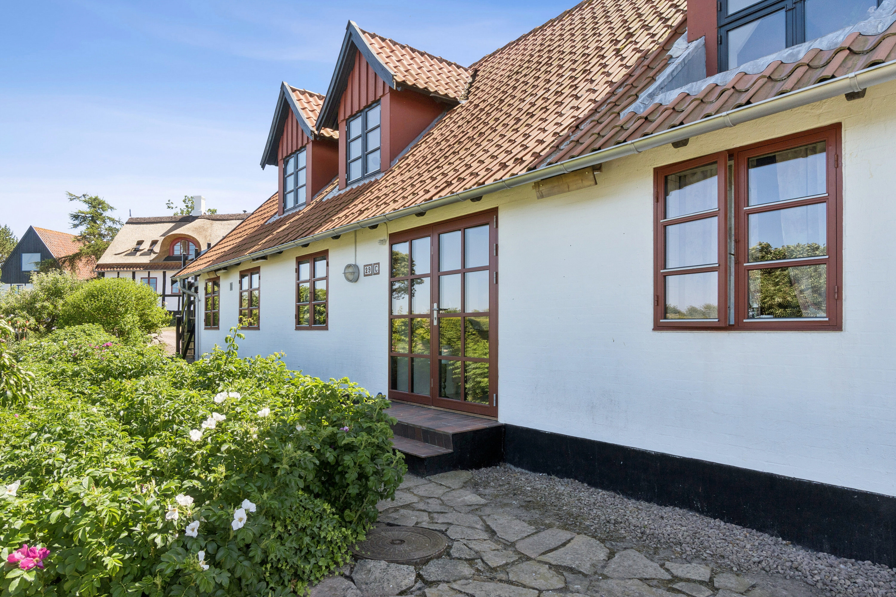 Fremhævet set fra haven billede i fuldskærmstilstand. Billede af Bølshavn 29C, Bølshavn, 3740 Svaneke