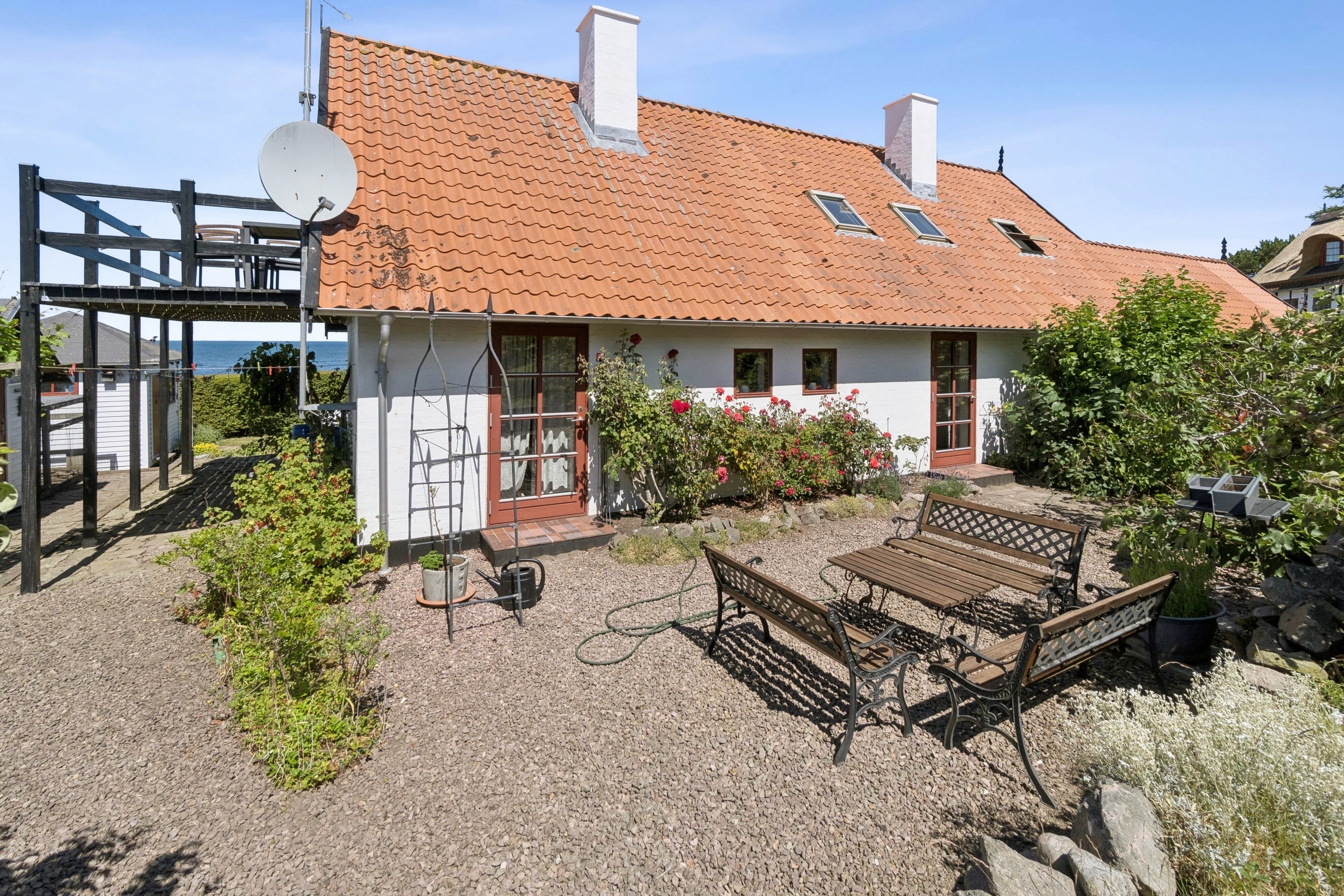 Fremhævet set fra haven billede i fuldskærmstilstand. Billede af Bølshavn 29C, Bølshavn, 3740 Svaneke