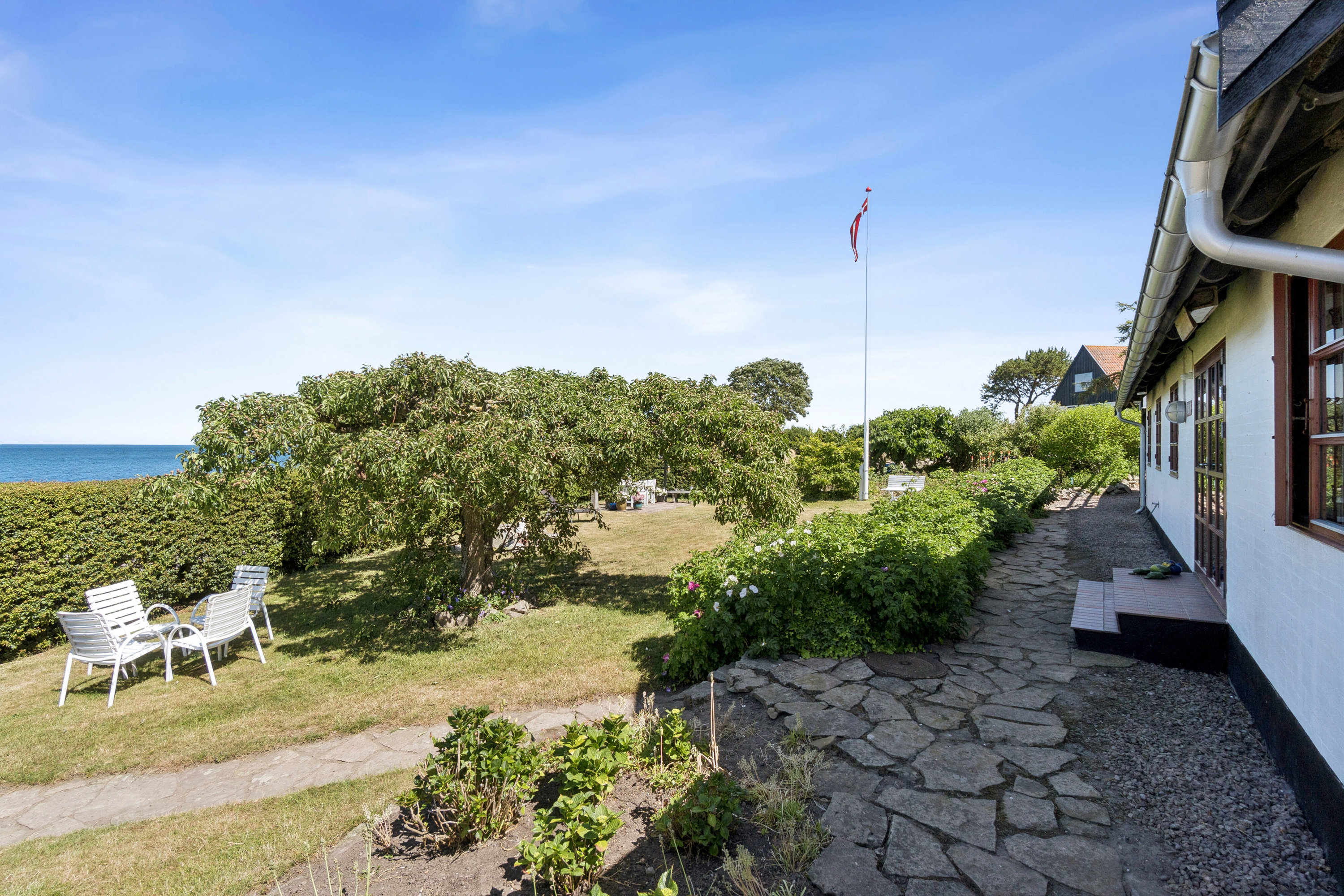 Fremhævet set fra haven billede i fuldskærmstilstand. Billede af Bølshavn 29C, Bølshavn, 3740 Svaneke