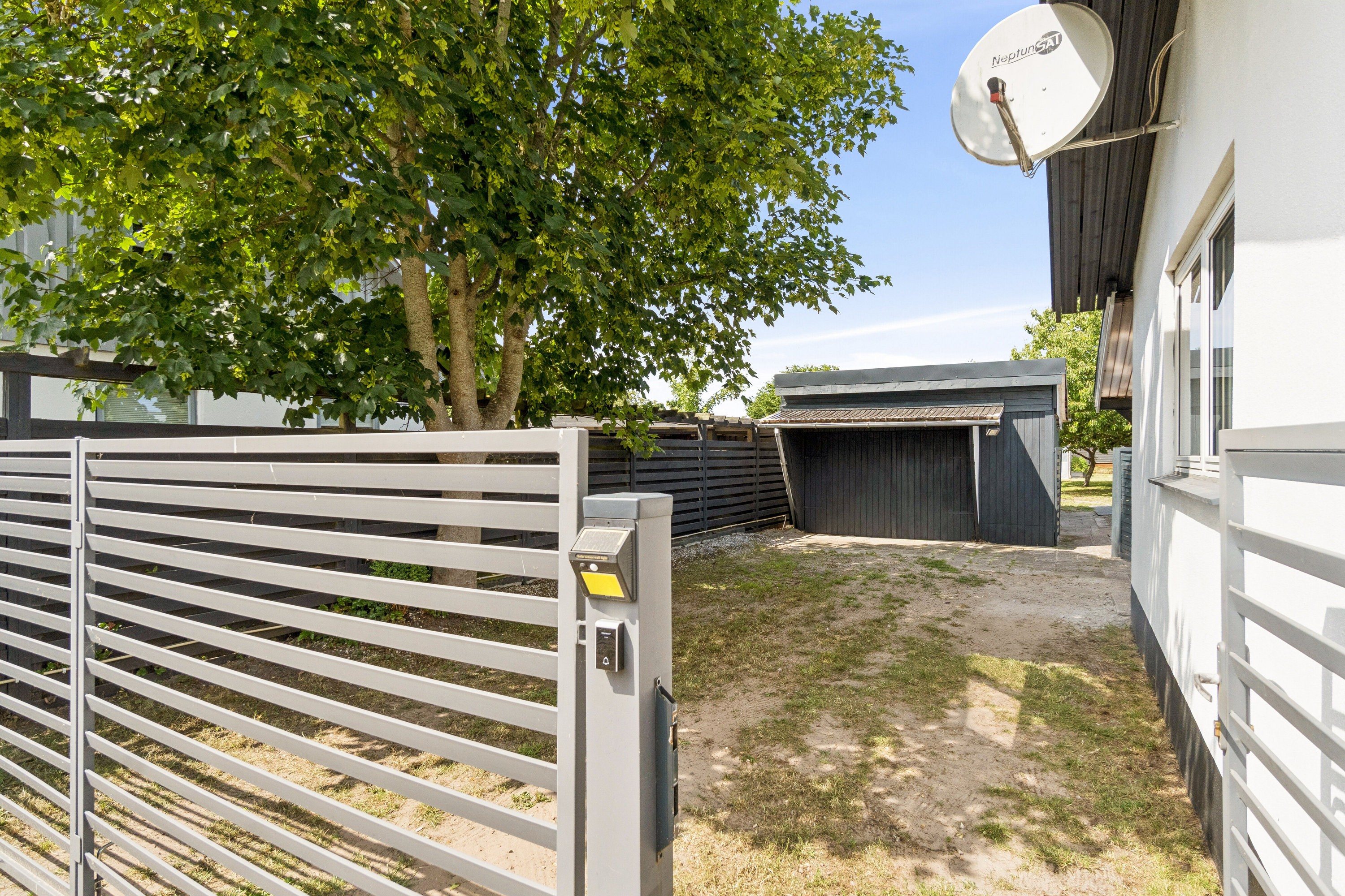 Fremhævet udendørs billede i fuldskærmstilstand. Billede af Ådalsvej 14, Enghaven, 3300 Frederiksværk