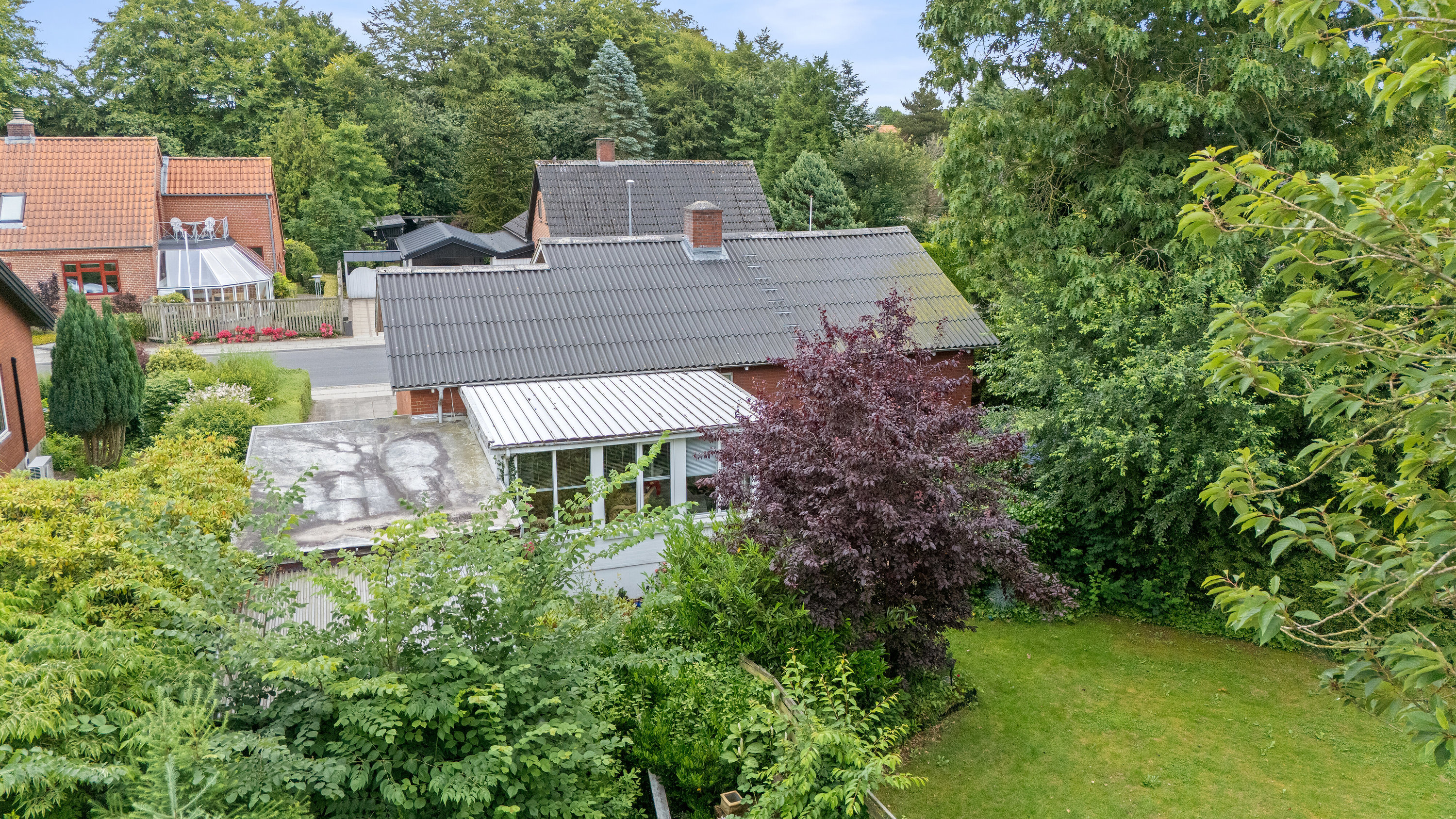Fremhævet set fra haven billede i fuldskærmstilstand. Billede af Løvlundvej 7, 7250 Hejnsvig