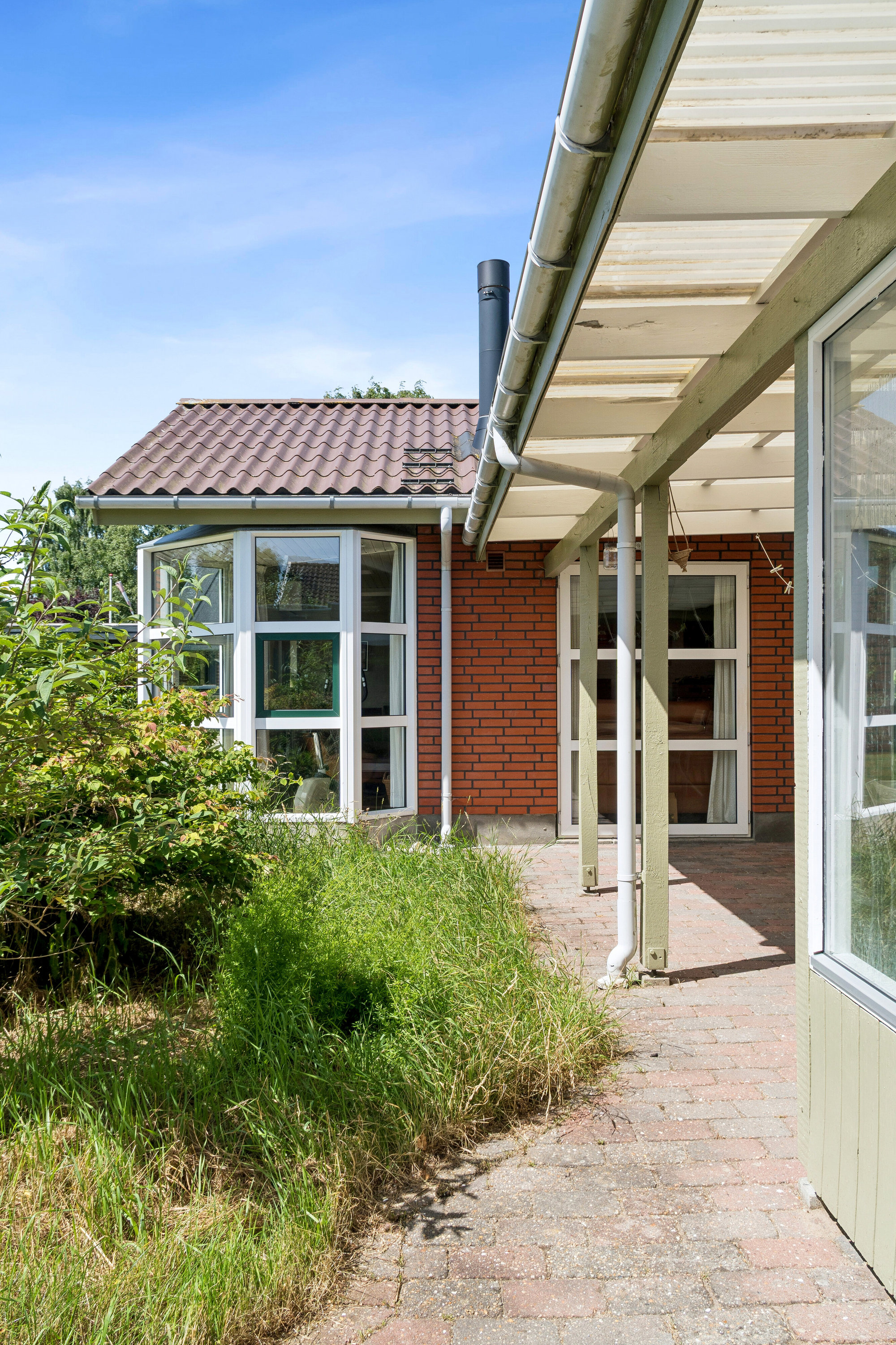 Fremhævet set fra haven billede i fuldskærmstilstand. Billede af Mølleparken 239, 7190 Billund