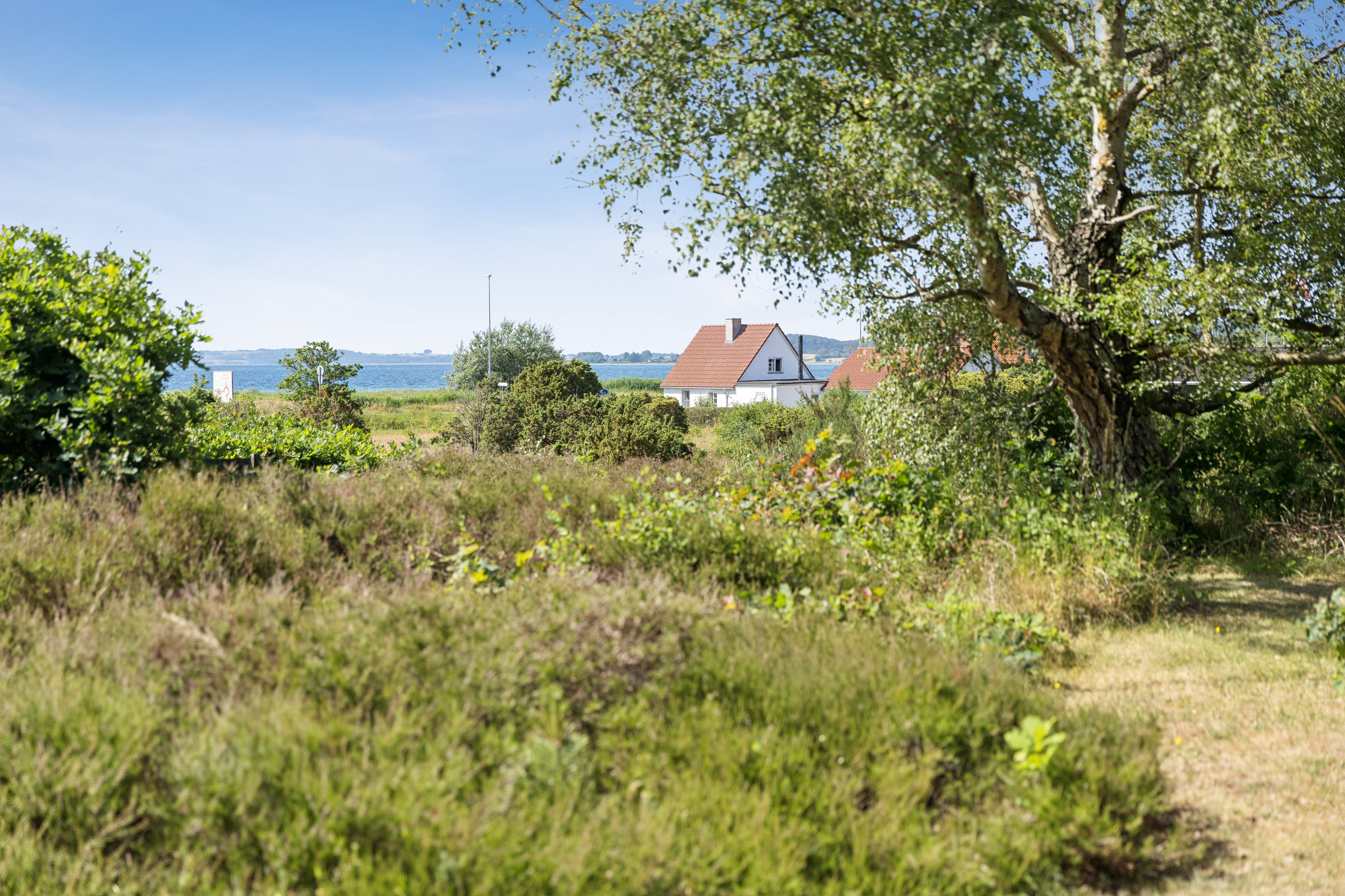 Fremhævet have billede i fuldskærmstilstand. Billede af Nordmandsvej 12, Femmøller Strand, 8400 Ebeltoft