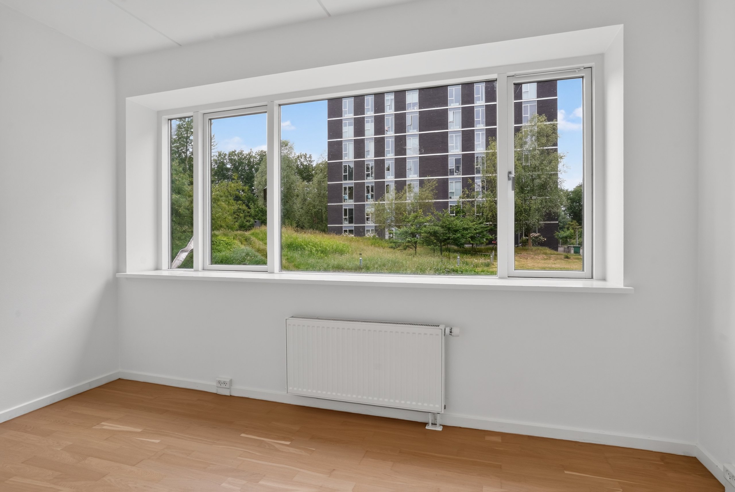 Fremhævet stue billede i fuldskærmstilstand. Billede af Gyngemose Parkvej 24, st. mf., 2860 Søborg