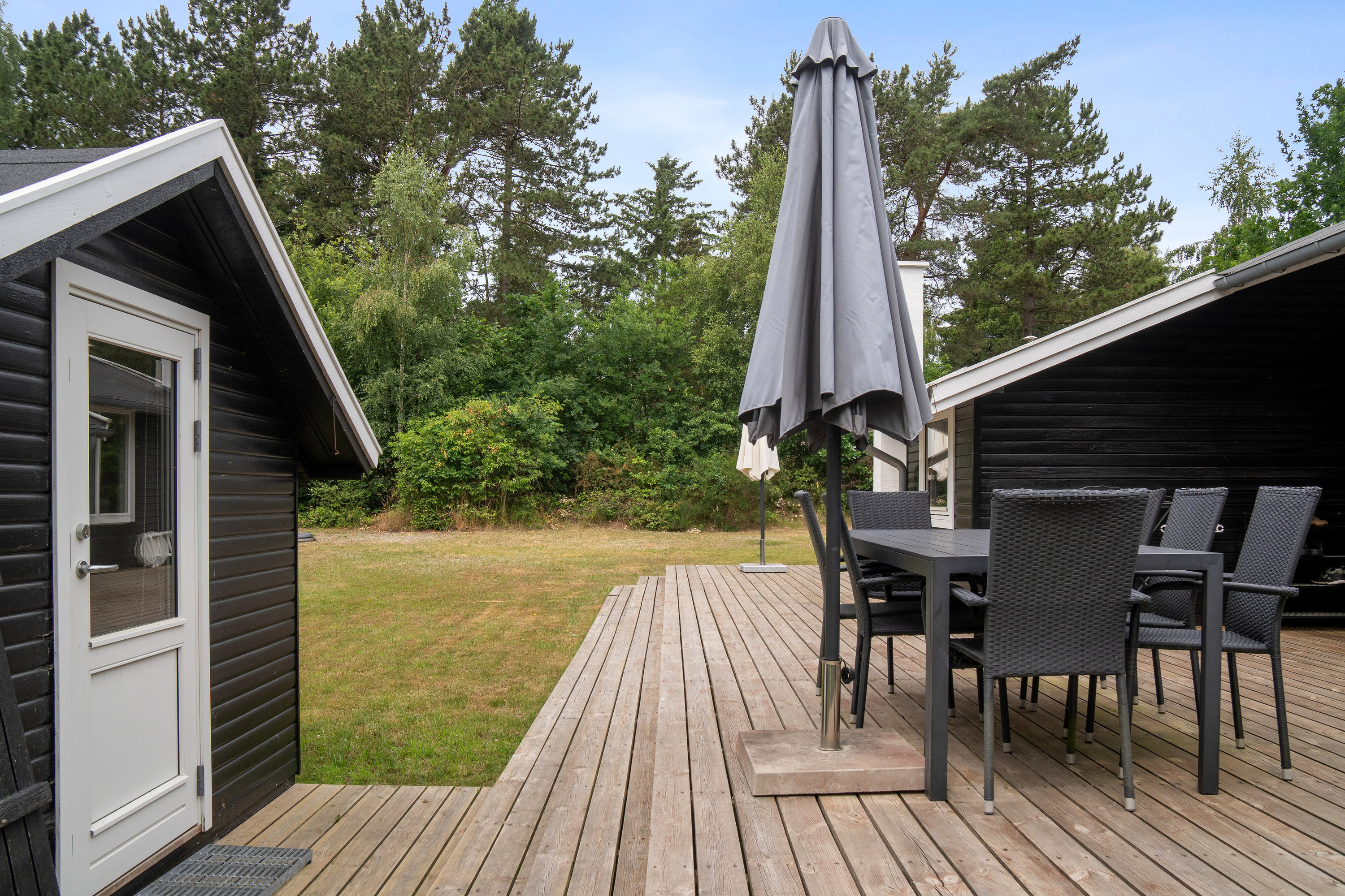 Fremhævet set fra haven billede i fuldskærmstilstand. Billede af Saturnvej 24, Højby Lyng, 4573 Højby