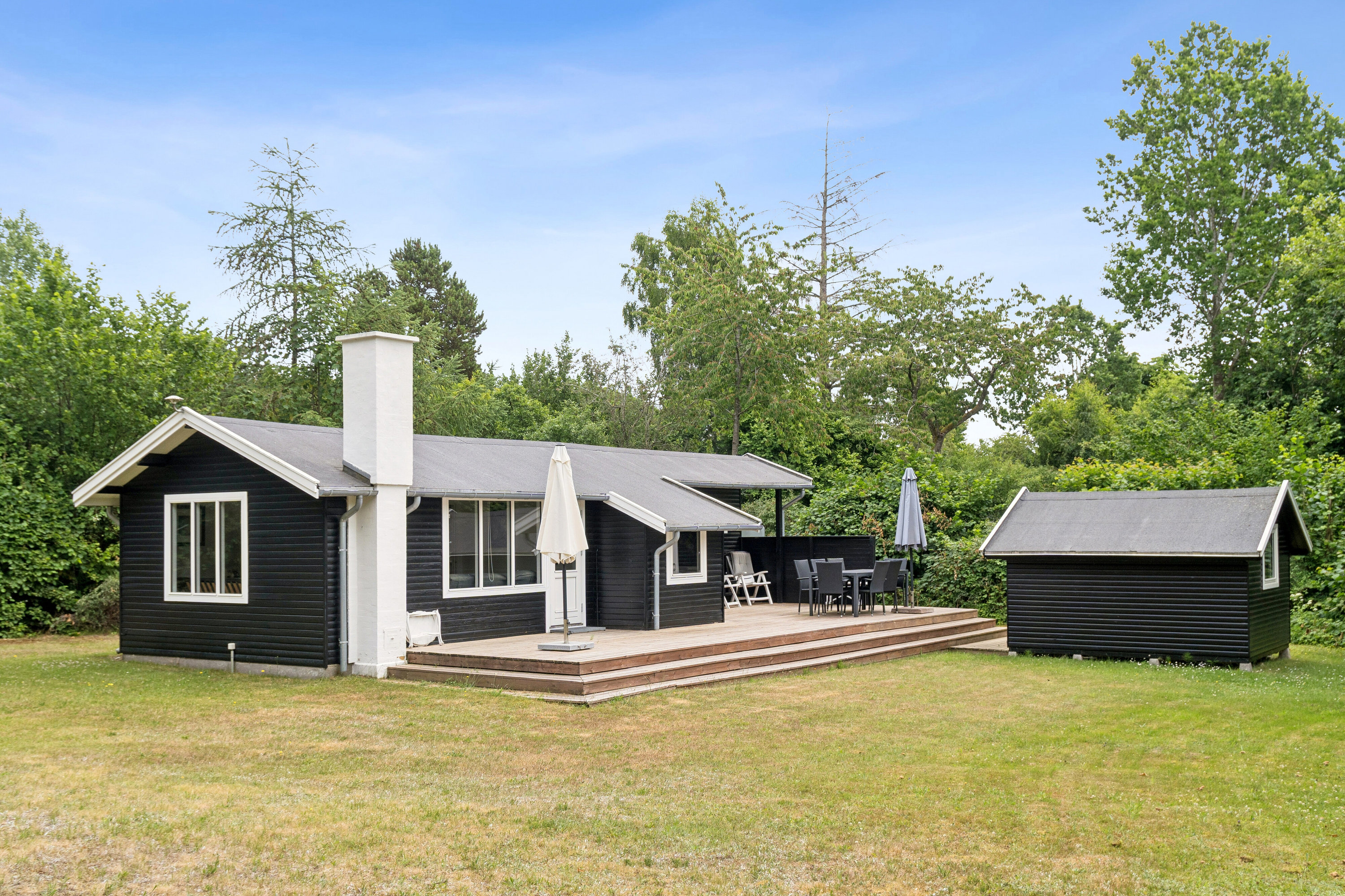 Fremhævet set fra haven billede i fuldskærmstilstand. Billede af Saturnvej 24, Højby Lyng, 4573 Højby