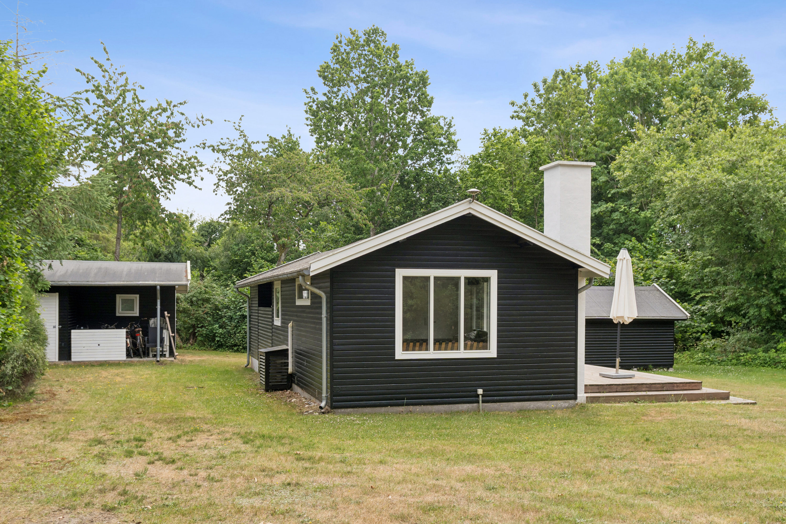 Fremhævet set fra haven billede i fuldskærmstilstand. Billede af Saturnvej 24, Højby Lyng, 4573 Højby
