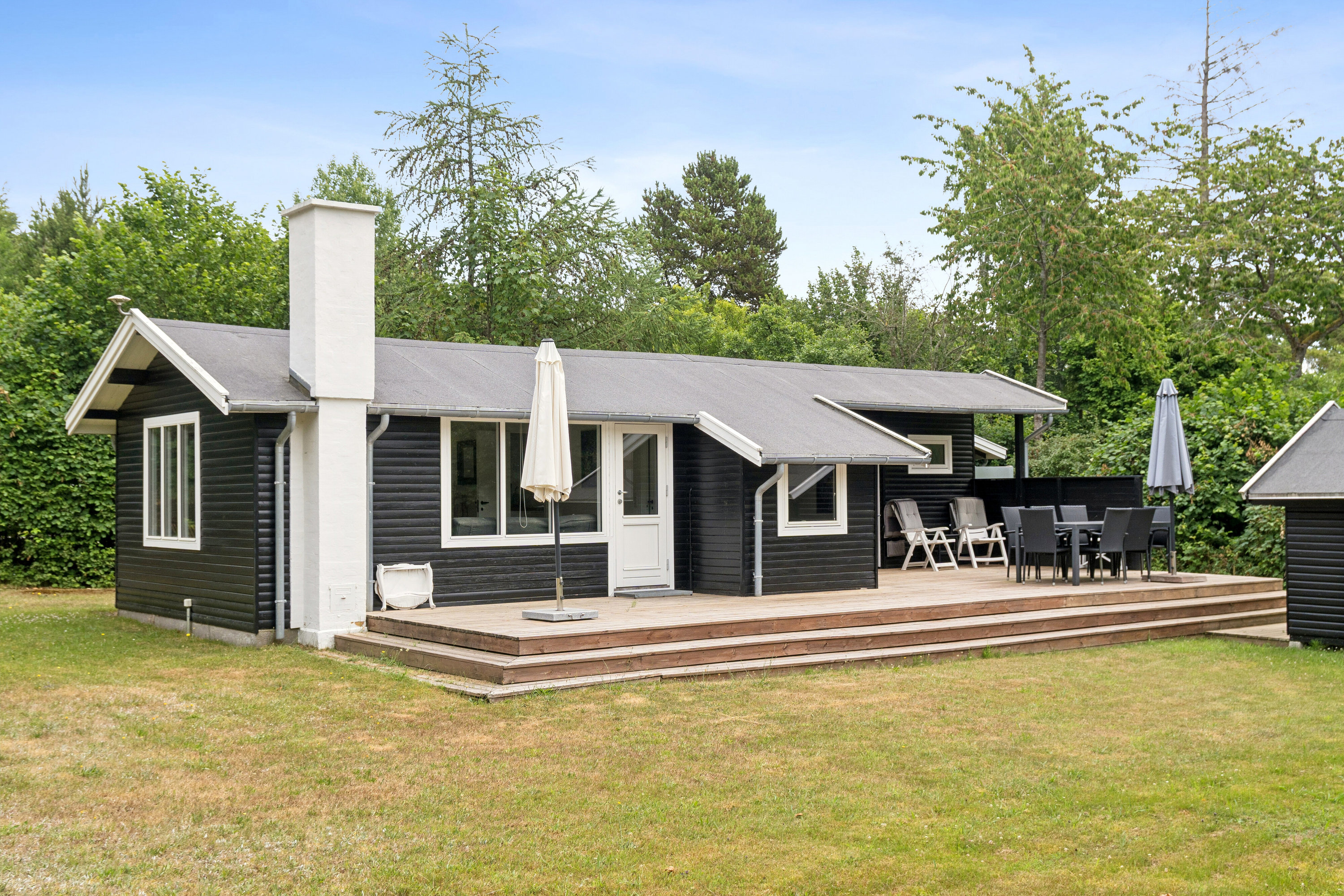 Fremhævet set fra haven billede i fuldskærmstilstand. Billede af Saturnvej 24, Højby Lyng, 4573 Højby