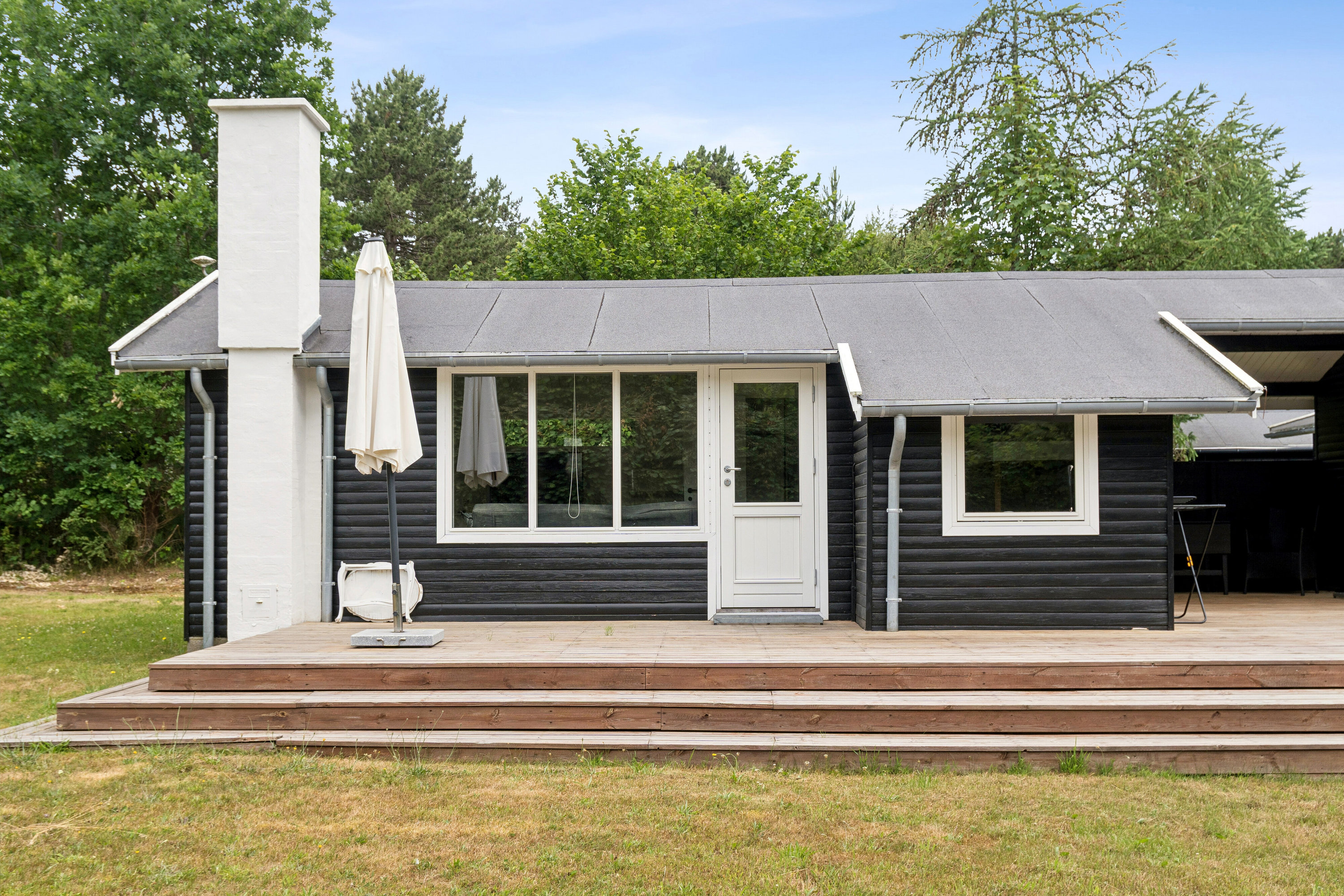 Fremhævet set fra haven billede i fuldskærmstilstand. Billede af Saturnvej 24, Højby Lyng, 4573 Højby