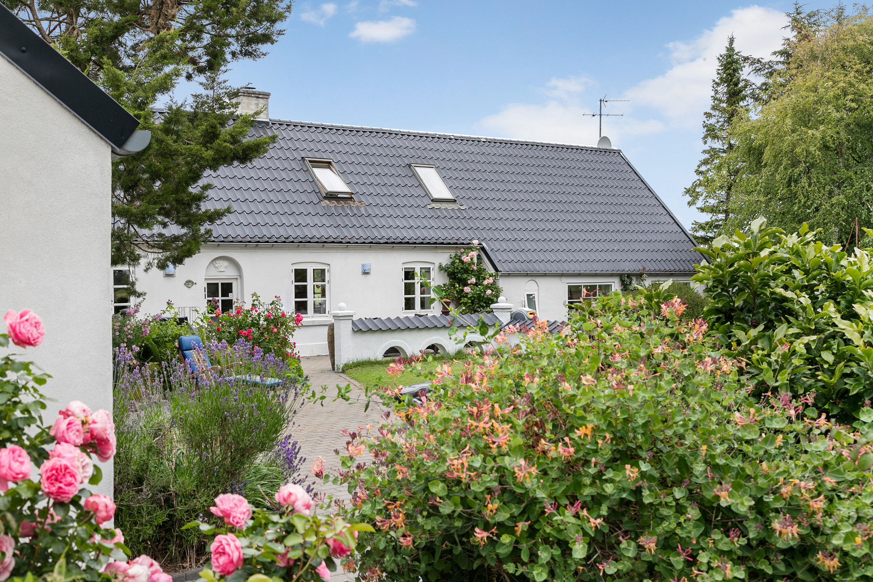 Fremhævet facade billede i fuldskærmstilstand. Billede af Slettestrandvej 28, Hjortdal, 9690 Fjerritslev