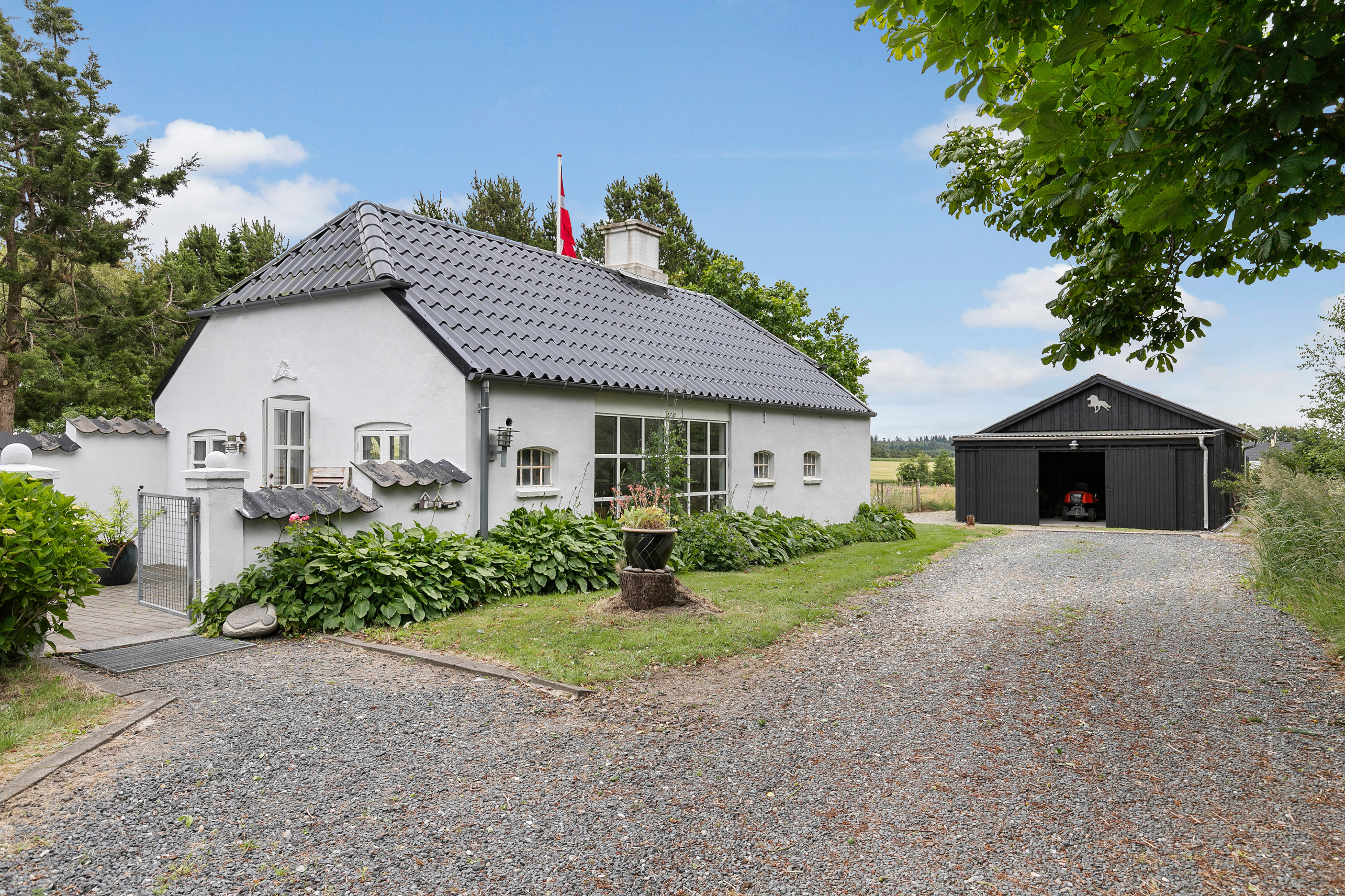 Fremhævet facade billede i fuldskærmstilstand. Billede af Slettestrandvej 28, Hjortdal, 9690 Fjerritslev