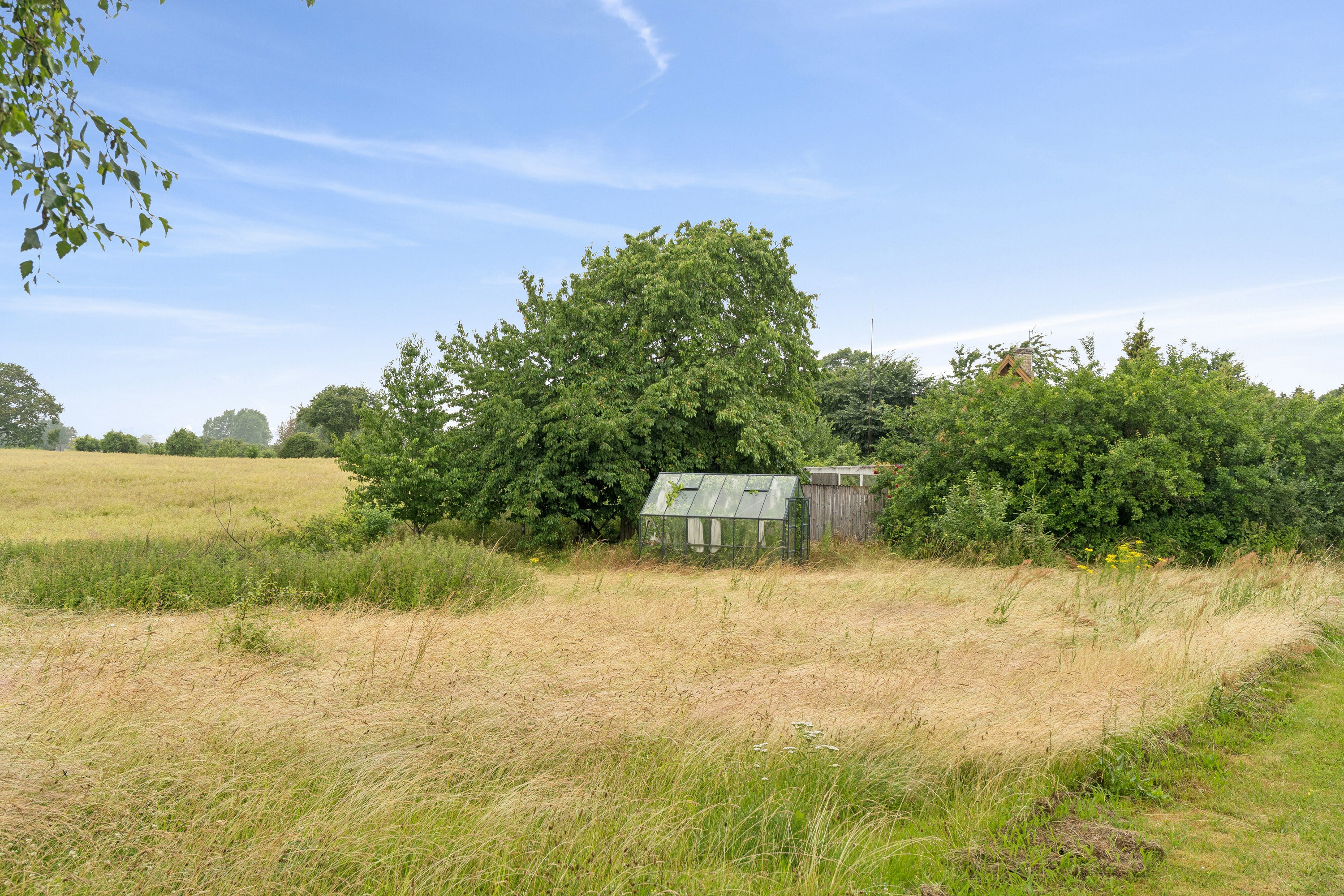 Fremhævet set fra haven billede i fuldskærmstilstand. Billede af Holsmosevej 6, Holsmose, 5800 Nyborg