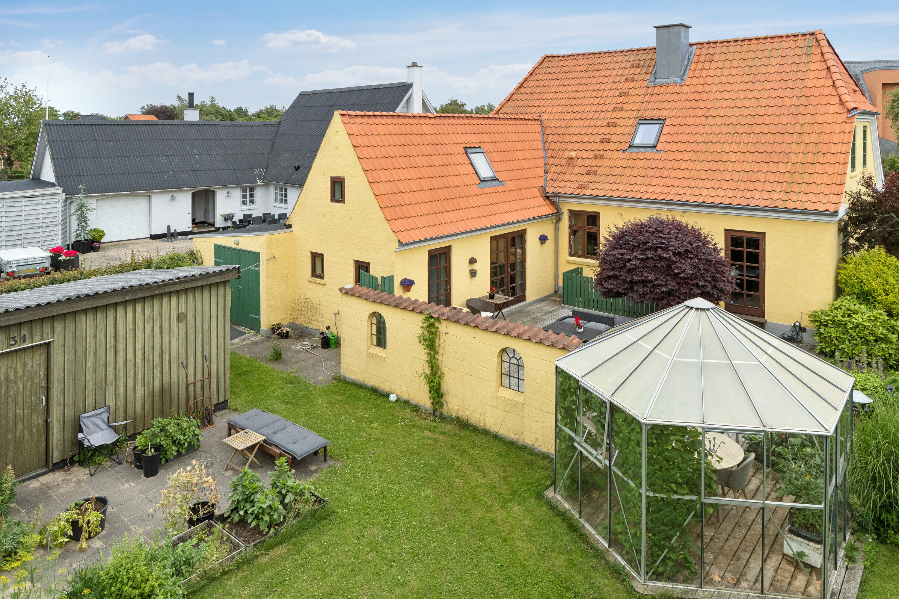 Fremhævet set fra haven billede i fuldskærmstilstand. Billede af Nørrebro 31, 9881 Bindslev