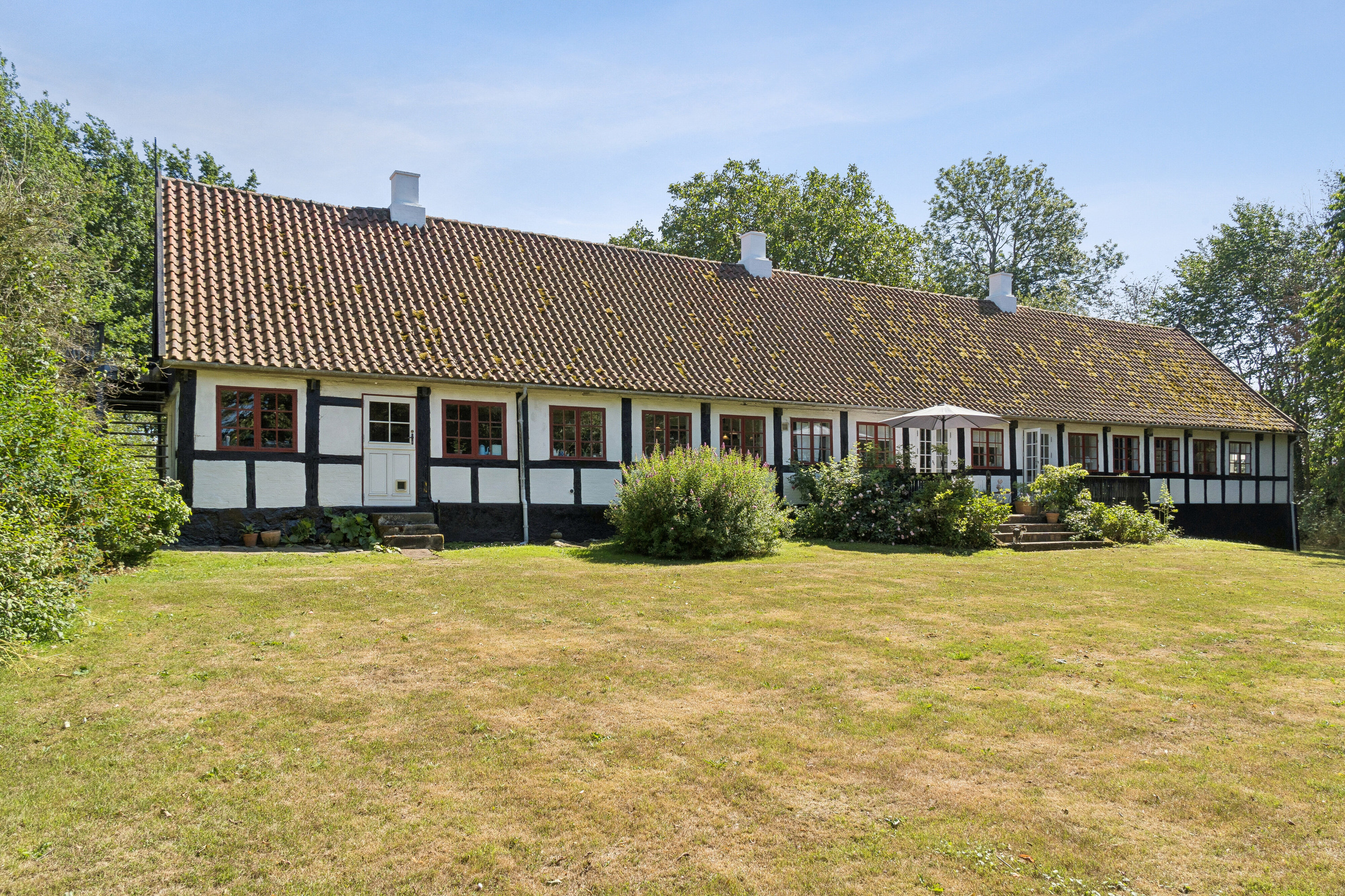 Fremhævet set fra haven billede i fuldskærmstilstand. Billede af Saltunavej 3, 3751 Østermarie